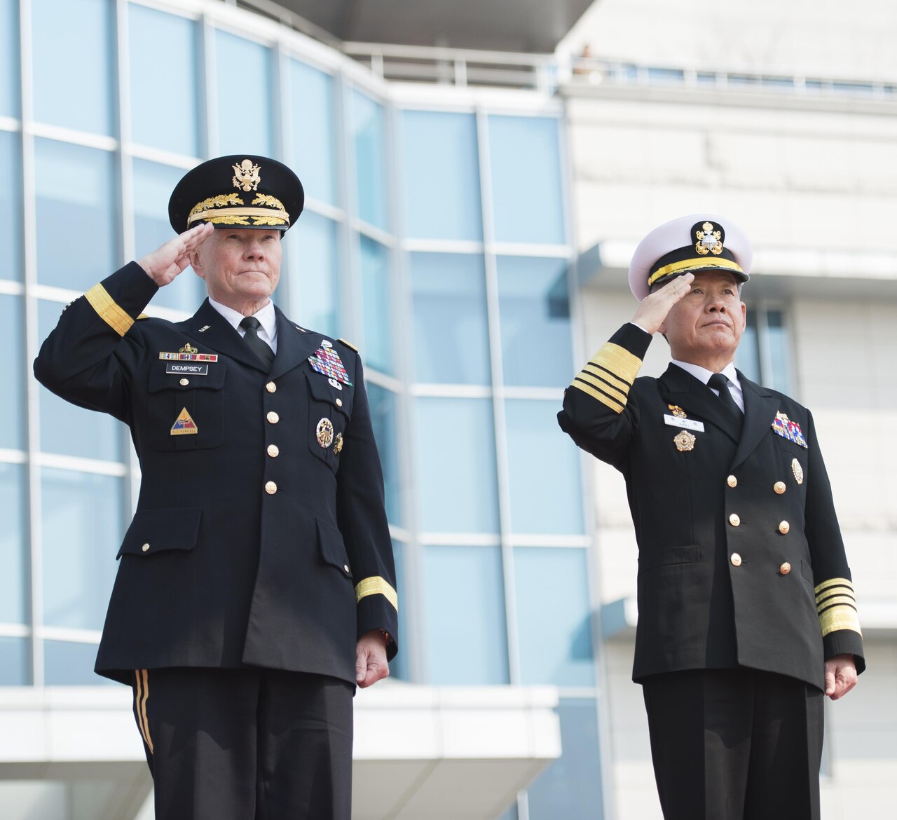 U.S. Army Gen. Martin E. Dempsey, left, chairman of the Joint Chiefs of Staff, and his South Korean counterpart, Adm. Choi Yoon-hee, salute during an honor ceremony at the headquarters of the South Korean Joint Chiefs of Staff in Seoul, South Korea, March 27, 2015. Dempsey is visiting Seoul as part of a two-day trip to reinforce the U.S.-South Korean alliance. DoD photo by U.S. Navy Petty Officer 1st Class Daniel Hinton
