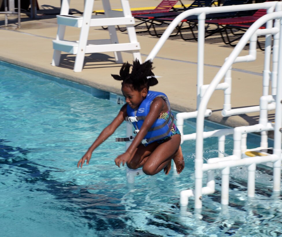 A child plays in Marine Corps Logistics Base Albany's pool as part of the 2015 Summer Reading Program awards ceremony, Aug. 22.
The ceremony was held at the installation’s Town and Country Restaurant Grand Ballroom. Top readers in four different age groups received trophies and all of the participants received certificates as their parents watched or photographed them. 