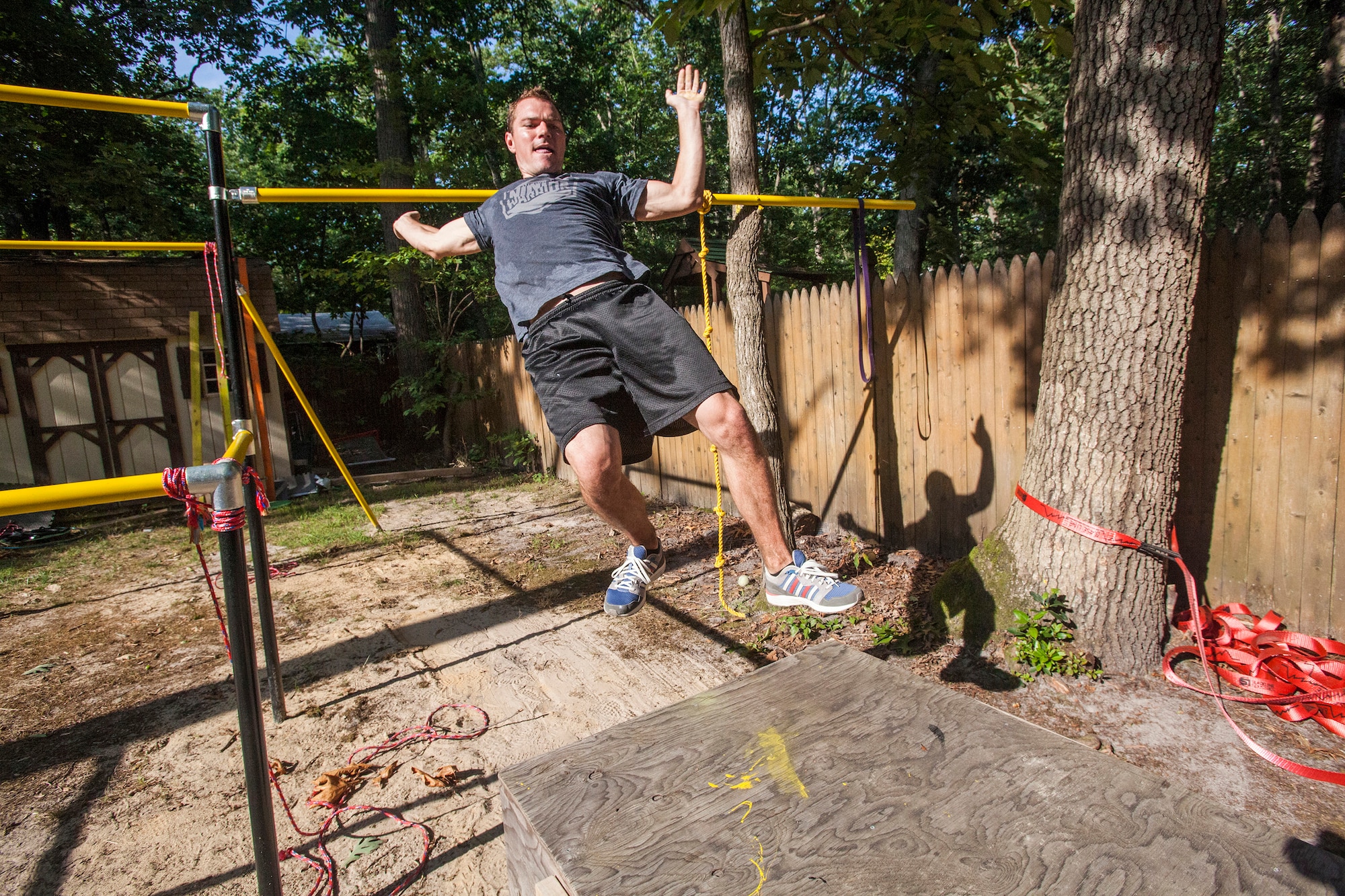 Tech. Sgt. Justin B. Gielski trains to compete on the TV show “American Ninja Warrior” in the backyard of his home in Medford, N.J., Aug. 21, 2015. Gielski placed fifth in the all-military city final on the TV show and advanced to the finals in Las Vegas. Gielski is a loadmaster with the 150th Special Operations Squadron, 108th Wing, New Jersey Air National Guard, located at Joint Base McGuire-Dix-Lakehurst, N.J. (U.S. Air National Guard photo by Master Sgt. Mark C. Olsen/Released)