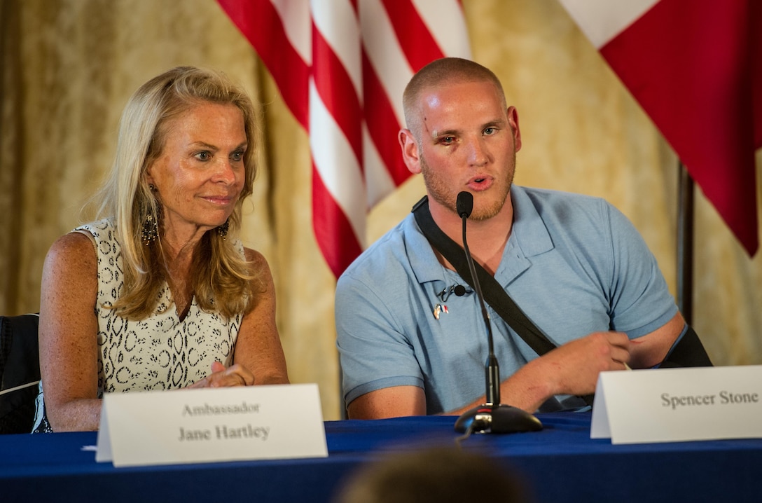 U.S. Air Force Airman 1st Class Spencer Stone briefs reporters during a news conference with U.S. Ambassador to France Jane D. Hartley in Paris, Aug. 23, 2015. During the event, Hartley hailed Stone and his friends, U.S. Army Spc. Alek Skarlatos and college student Anthony Sadler, as heroes for their actions to thwart an attack by a gunman on a Paris-bound train. U.S. Air Force photo by Tech. Sgt. Ryan Crane