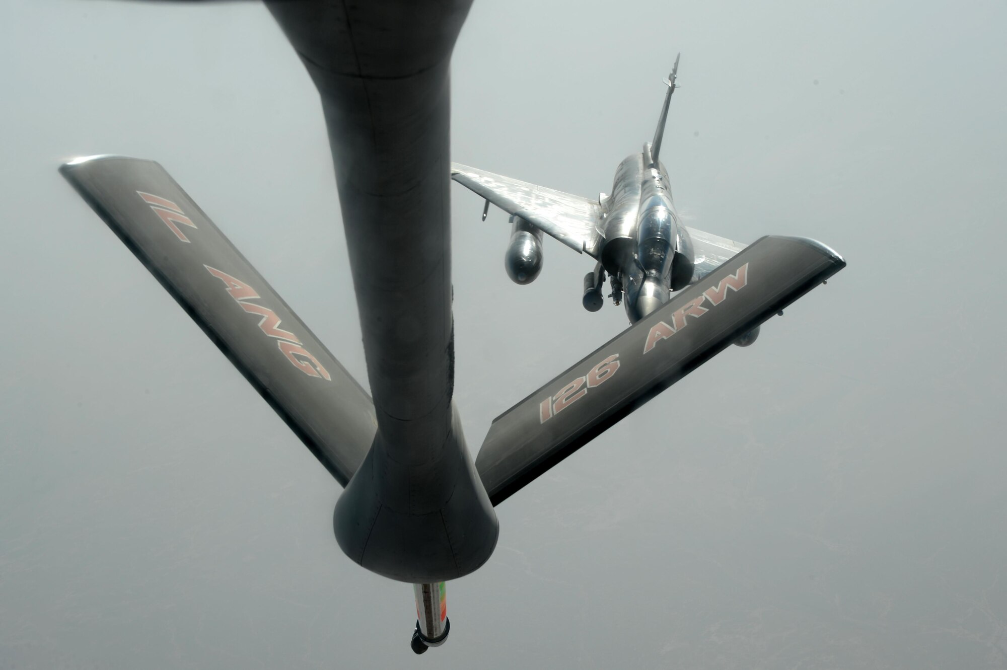 A French Dassault Mirage approaches a U.S. KC-135 Stratotanker to refuel over Southwest Asia in support of Operation Inherent Resolve, Aug. 20, 2015. OIR is the military intervention against Daesh. (U.S. Air Force photo by Staff Sgt. Sandra Welch)