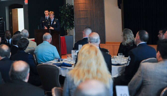 WRIGHT-PATTERSON AIR FORCE BASE, Ohio – Col. Leah Lauderback, National Air and Space Intelligence Center commander, speaks to the current and former employees of NASIC during the Commanders Award for Merit ceremony here Aug. 19, 2015. Since 1974 NASIC has used the CAM awards banquet to recognize top performers. (U.S. Air Force Photo by Airman 1st Class Samuel Earick)   