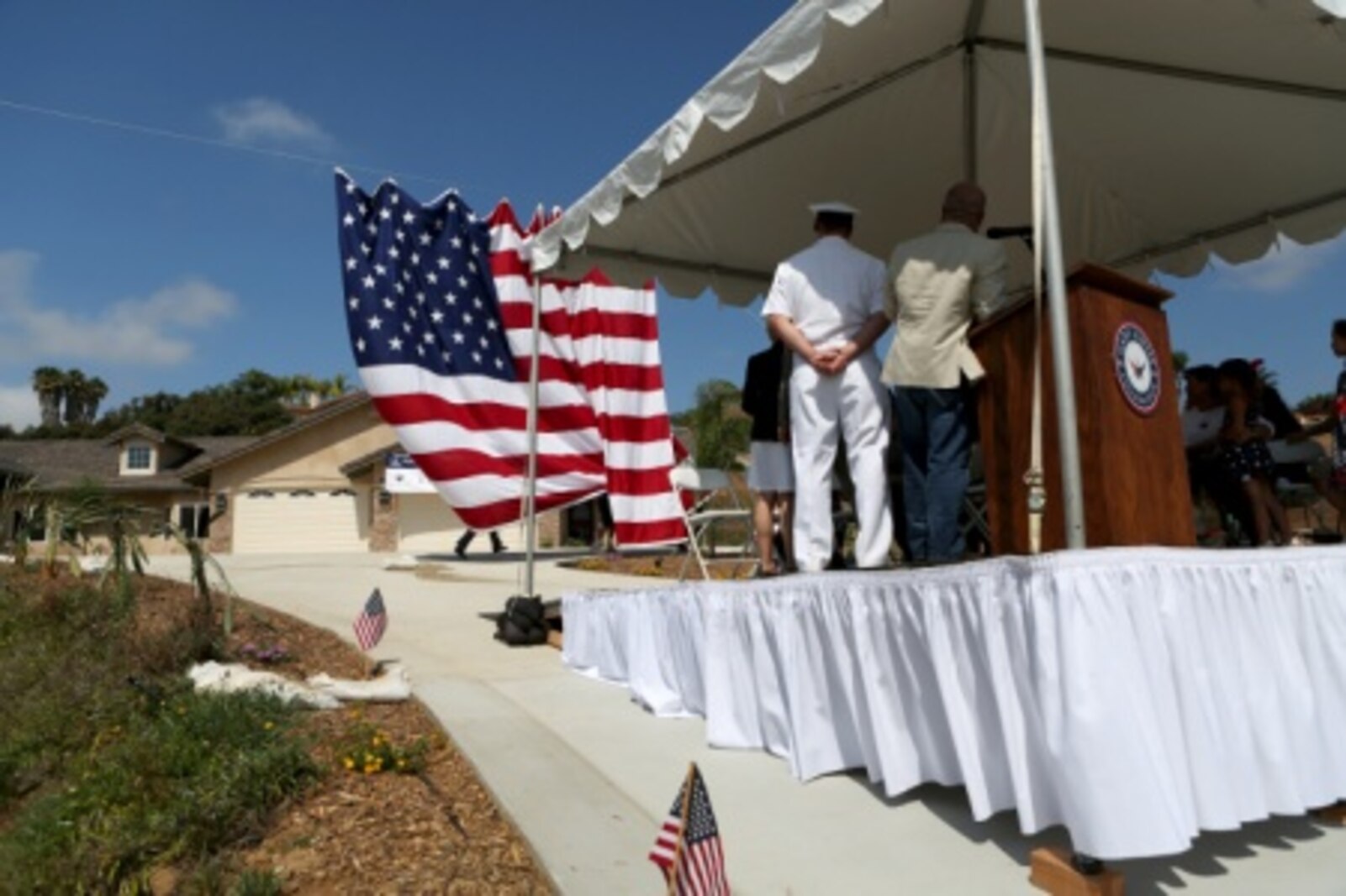 Members of The Gary Sinise foundation unveil a new home built and dedicated to retired Staff Sgt. Jason Ross and his family through the foundation’s Restoring Independence Supporting Empowerment program. Ross was injured by an improvised explosive device in Afghanistan in 2011 while serving as an explosive ordnance disposal technician and lost both of his legs as a result. The new home has smart technology that will significantly reduce the difficulty of everyday tasks for Ross and allow him and his family to live more comfortably.
