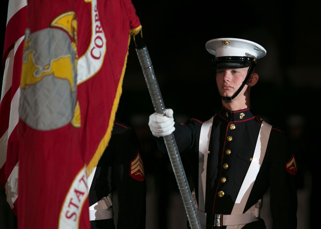 The Marine Corps Color Guard performs during an Evening Parade at Marine Barracks Washington, D.C., Aug. 21, 2015. The guests of honor for the Evening Parade were the Mayor of Chattanooga, Tenn., Mayor Andy Berke, the Chief of Chattanooga Police, Fred Fletcher and the Hamilton County Director of Emergency Services and Homeland Security, Tony Reavley, and the hosting official was Lt. Gen. Richard Mills, commander of Marine Forces Reserve and Marine Forces North. (U.S. Marine Corps photo by Cpl. Christian Varney/Released)