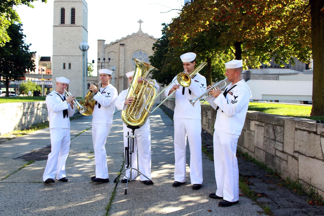 The "Brass Ambassadors," members of Navy Band Great Lakes, play music during the Navy’s commemoration of the Bicentennial of the War of 1812 in Detroit, Sept. 9, 2012. The event hosts service members from the Navy, Marine Corps, Coast Guard and Canadian navy. U.S. Navy photo by Petty Officer 1st Class Todd A. Stafford