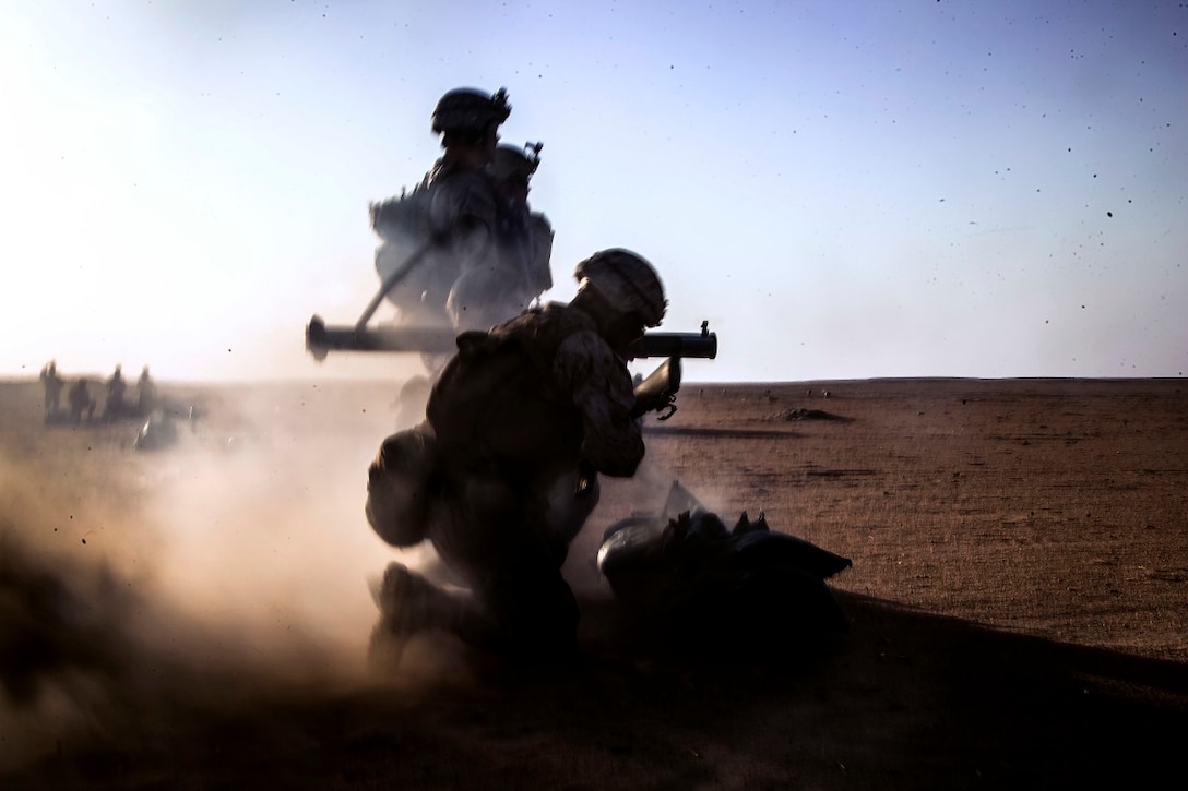 KUWAIT (Aug. 18, 2015) A U.S. Marine with Lima Company, Battalion Landing Team 3rd Battalion, 1st Marine Regiment, 15th Marine Expeditionary Unit (MEU), fires an MK 153 Shoulder Launched Multi-purpose Assault Weapon at a target during squad-level training. Elements of the 15th MEU are ashore in Kuwait for sustainment training to maintain and enhance the skills they developed during their pre-deployment training period. The 15th MEU is embarked on the Essex Amphibious Ready Group and deployed to maintain regional security in the U.S. 5th Fleet area of operations. (U.S. Marine Corps photo by Cpl. Elize McKelvey/Released)