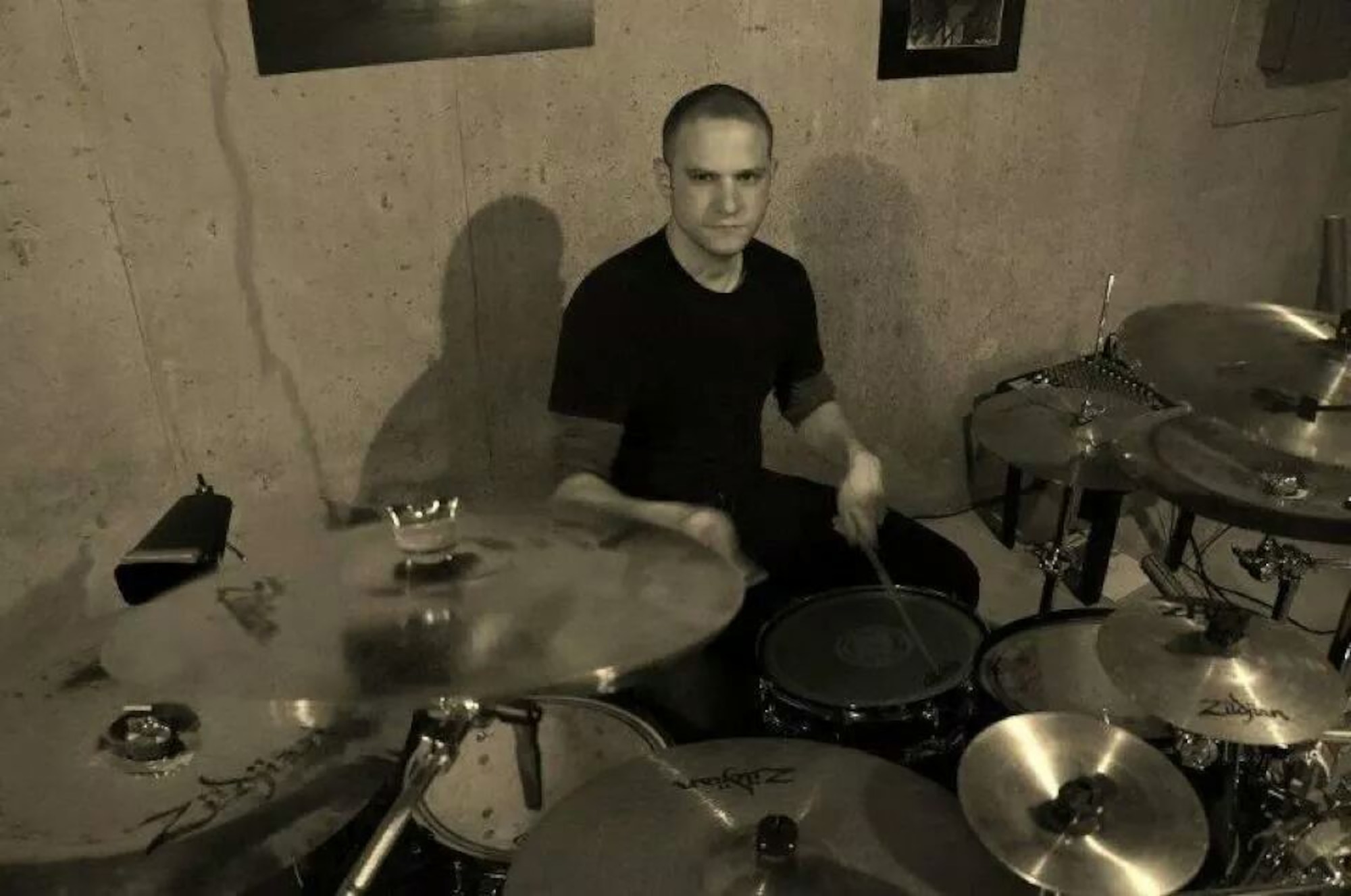 Tech. Sgt. Robert Van Ghle plays drums in a practice session with heavy Christian rock band ofDavid. Van Ghle works as an Air Reserve Personnel Center NCO in charge of board operations on Buckley Air Force Base, Colo. (U.S. Air Force courtesy photo)