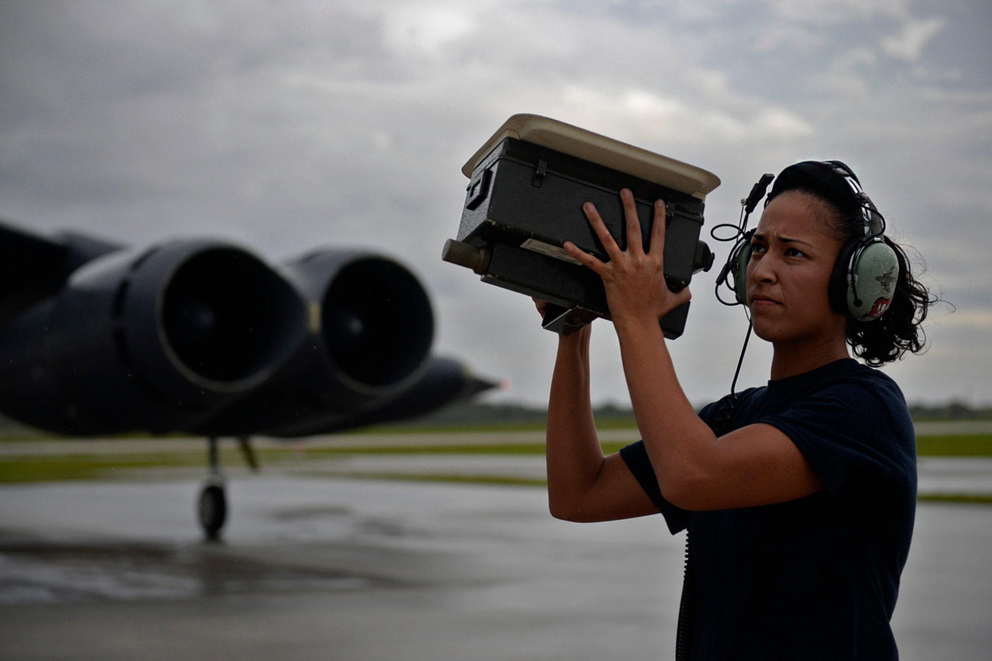 Senior Airman Alexandra Washington, communications and navigations technician assigned to the 20th Expeditionary Aircraft Maintenance Squadron, checks antennae signals on a B-52 Stratofortress before flight Aug. 22, 2015, at Andersen Air Force Base, Guam. Bomber crews with the 20th Expeditionary Bomb Squadron from Barksdale Air Force Base, Louisiana, are part of U.S. Pacific Command’s continuous bomber presence and support ongoing operations in the Indo-Asia-Pacific region. (U.S. Air Force photo by Staff Sgt. Alexander W. Riedel/Released)