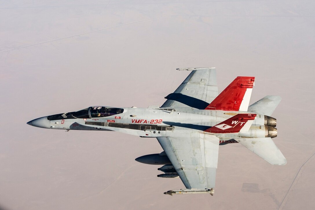 U.S. Marine Corps F/A-18s with Marine Fighter Attack Squadron 232 link up and perform an Air to Air refuel with a Royal Canadian Air Force CC-150 Polaris air-to-air refueller during a combat mission in the skies of Iraq on July 19, 2015. The ‘Red Devils’ of VMFA-232 are currently deployed with the Special Purpose Marine Air Ground Task Force-Crisis Response-Central Command and provide offensive strike and close air support to Operation Inherent Resolve and the global fight against the Islamic State of Syria and the Levant. 