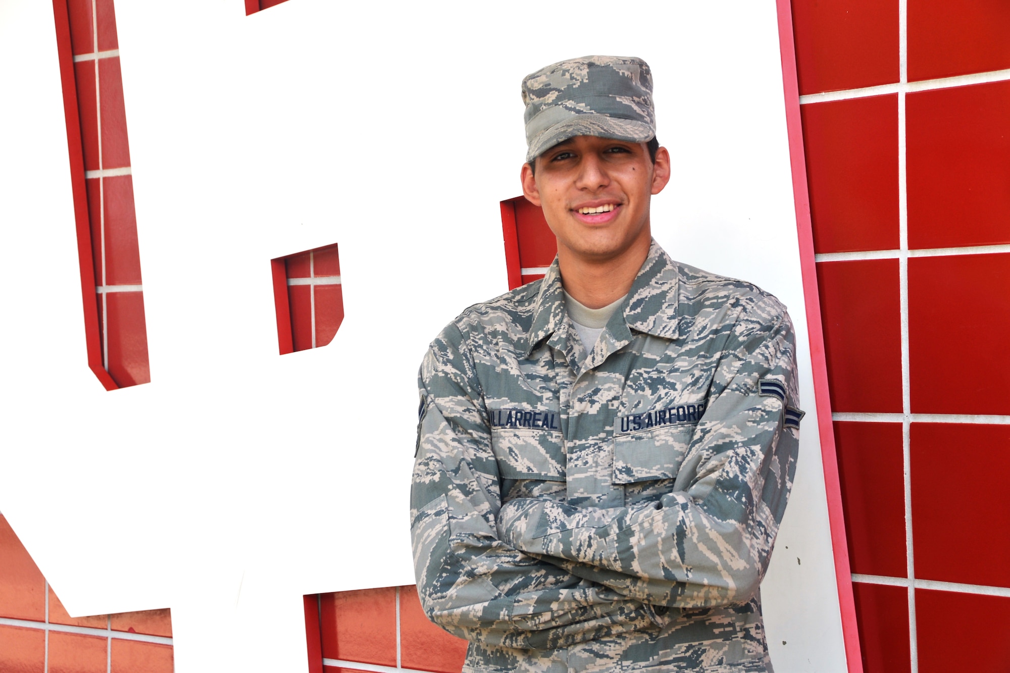 Airman First Class Alejandro Villarreal, 433rd Logistics Readiness Squadron, with just one year in the military, climbed into an overturned vehicle, and pulled a nine-year-old boy, with a broken leg from the back seat on Aug. 16, 2015. Villareal is a student and attends the University of Houston He was one four Air Force Reservists from Joint Base San Antonio-Lackland, Texas, who came upon an accident and immediately stopped to render care to the injured passengers. (U.S. Air Force Photo by Ms. Minnie Jones)
