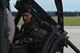 U.S. Air Force Master Sgt. Vincent Hnat, 41st Rescue Squadron special missions aviator, loads    rounds into an HH-60G Pave Hawk’s 50-caliber machine gun for aerial target practice before a night flight Aug. 19, 2015, at Moody Air Force Base, Ga. Hnat and crew chiefs from the 41st Helicopter Maintenance Unit worked together to prepare the aircraft’s weapon. (U.S. Air Force photo by Airman 1st Class Dillian Bamman/Released)