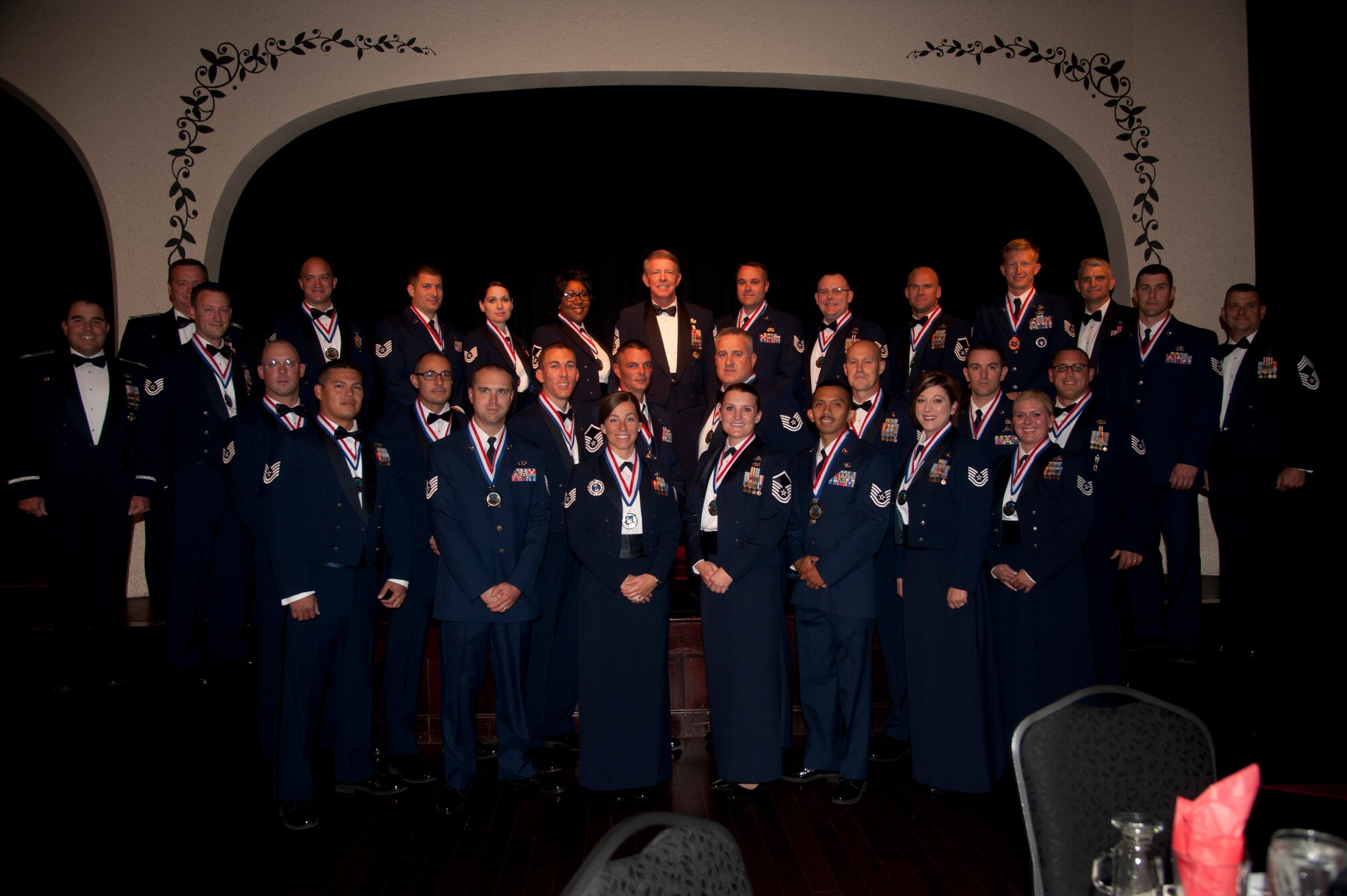 The 15th Chief Master Sgt. of the Air Force Rodney J. McKinley, stands with 25 master sergeant selects during the Senior Non-Commissioned Officer Induction Ceremony Aug. 21, 2015, at The Lincoln Center in Spokane, Wash. Master sergeant responsibilities are uniquely different from those of the NCO tier. These selectees will now transition from being technical experts and first line supervisors to leaders of operational competence. (U.S. Air Force photo/Airman 1st Class Taylor Bourgeous)