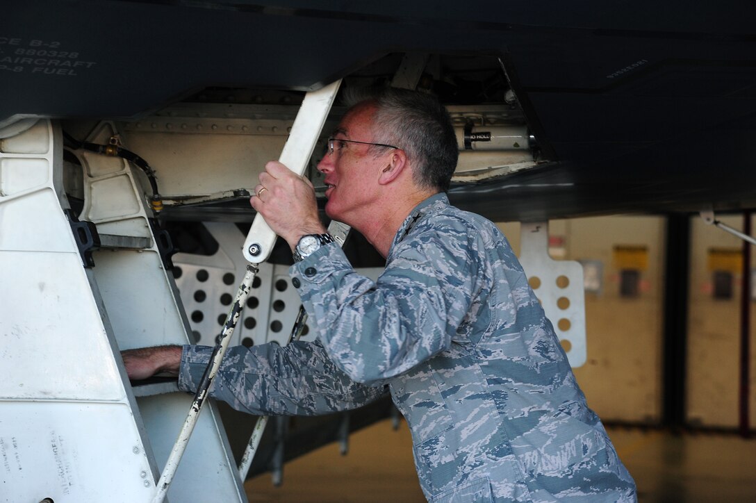 Gen. Paul J. Selva, 10th Vice Chairman of the Joint Chiefs of Staff, enters the cockpit of a B-2 Spirit, Aug. 21, 2015 at Whiteman Air Force Base, Mo. Selva visited several units on base and was given a tour of a B-2 Spirit. (U.S. Air Force photo by Senior Airman Joel Pfiester/Released)