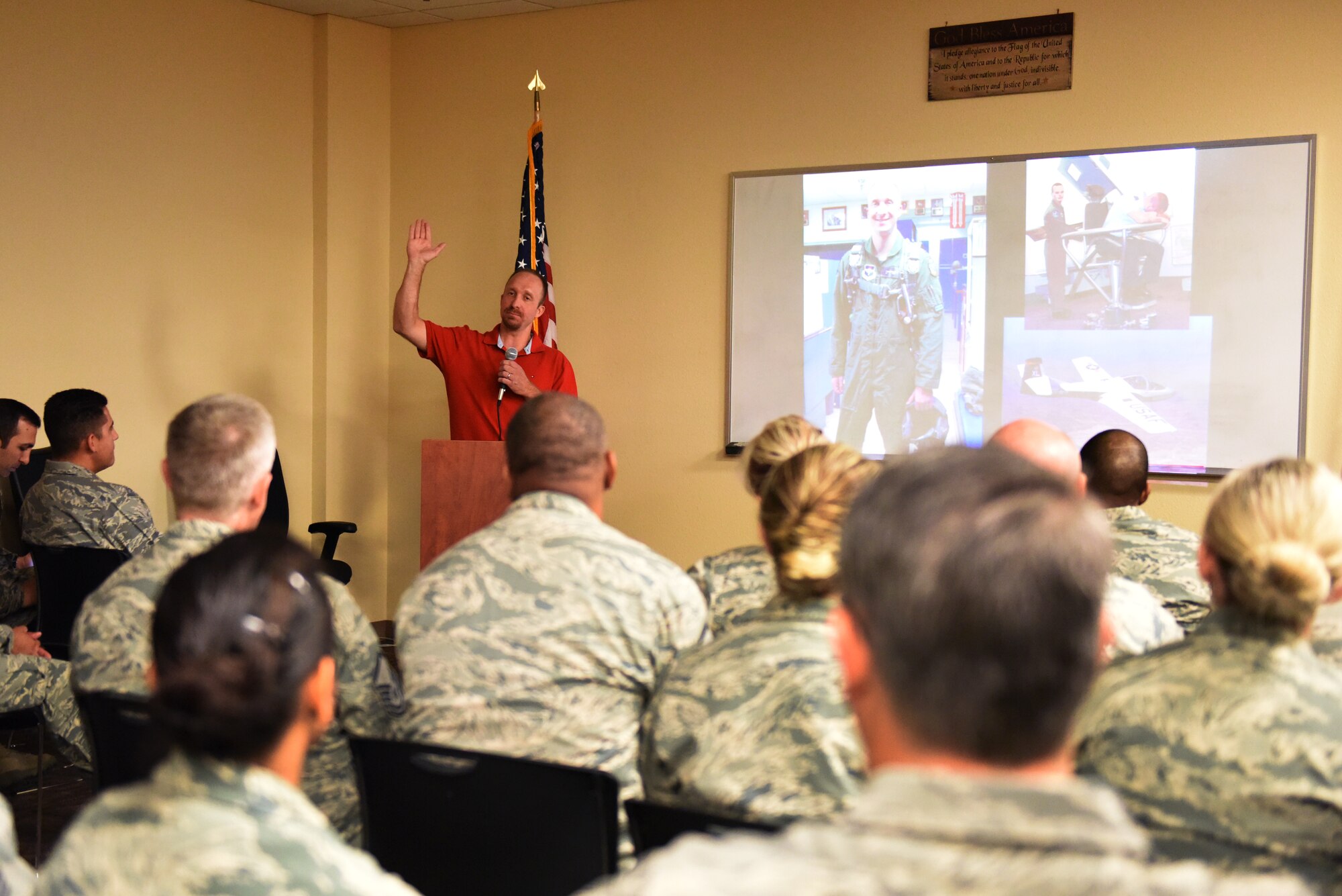 Capt. David Berling (Ret.), spoke to members of the 944th Medical Squadron about his personal experiences, perseverance, and resilience with hopes of also motivating the audience, Aug. 8, 2015. Berling was involved in a private plane crash in 2007, four years after commissioning as a contracting officer in the Air Force. He was medically retired from active duty in 2009 and is currently working on recertifying his private pilot's license while training on his hand-cycle in hopes of being named to the U.S. Paralympic Team. (U.S. Air Force photo by Staff Sgt. Lausanne Kinder)