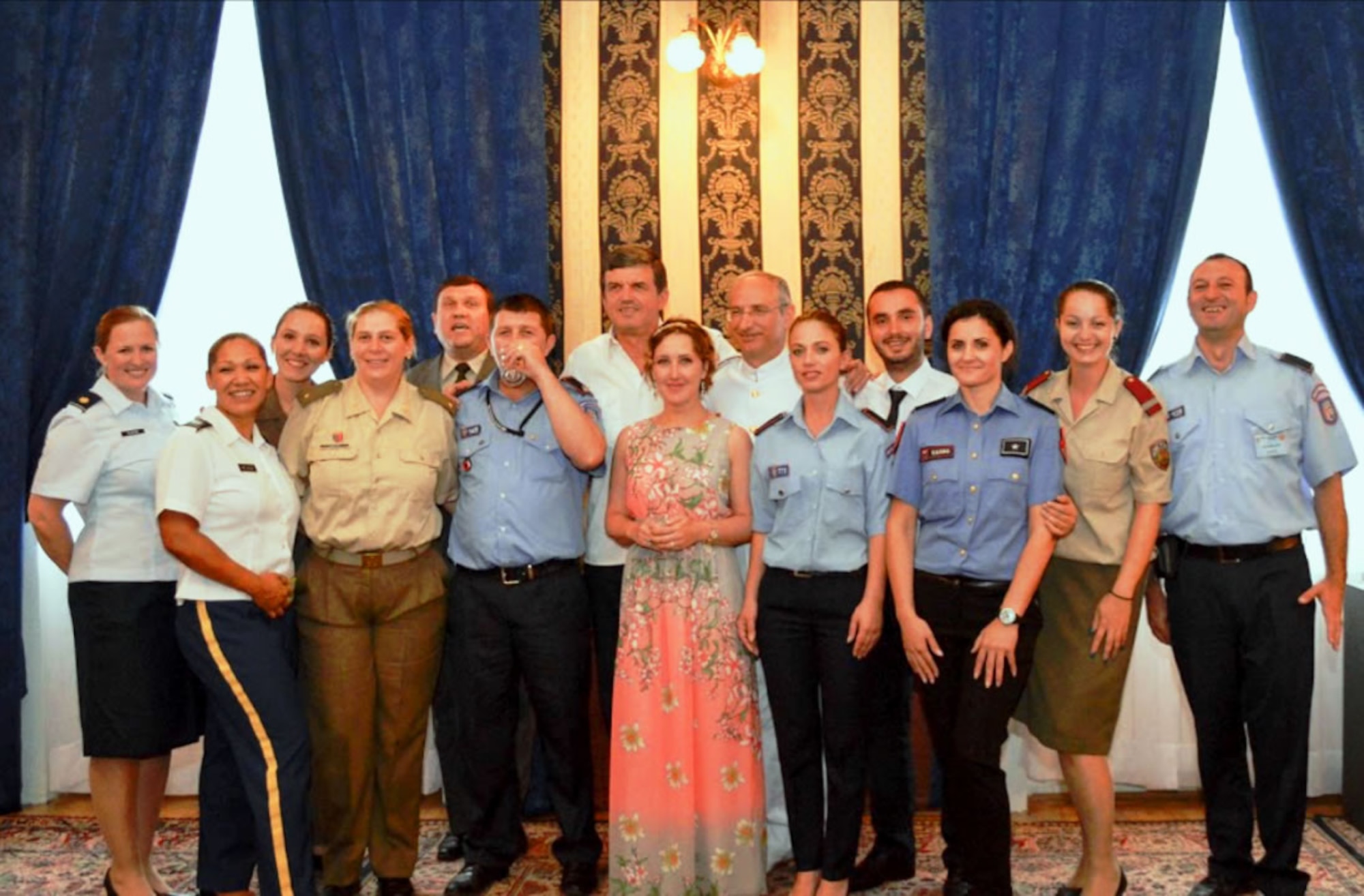 Instructors and students gather after the Inter-allied Confederation of Reserve Officers Language Academy 2015 graduation ceremony in Sofia, Bulgaria, Aug. 21, 2015. Students from NATO and Partnership for Peace countries spent two weeks learning and improving their skills in either English or French. (U.S. Air Force courtesy photo)