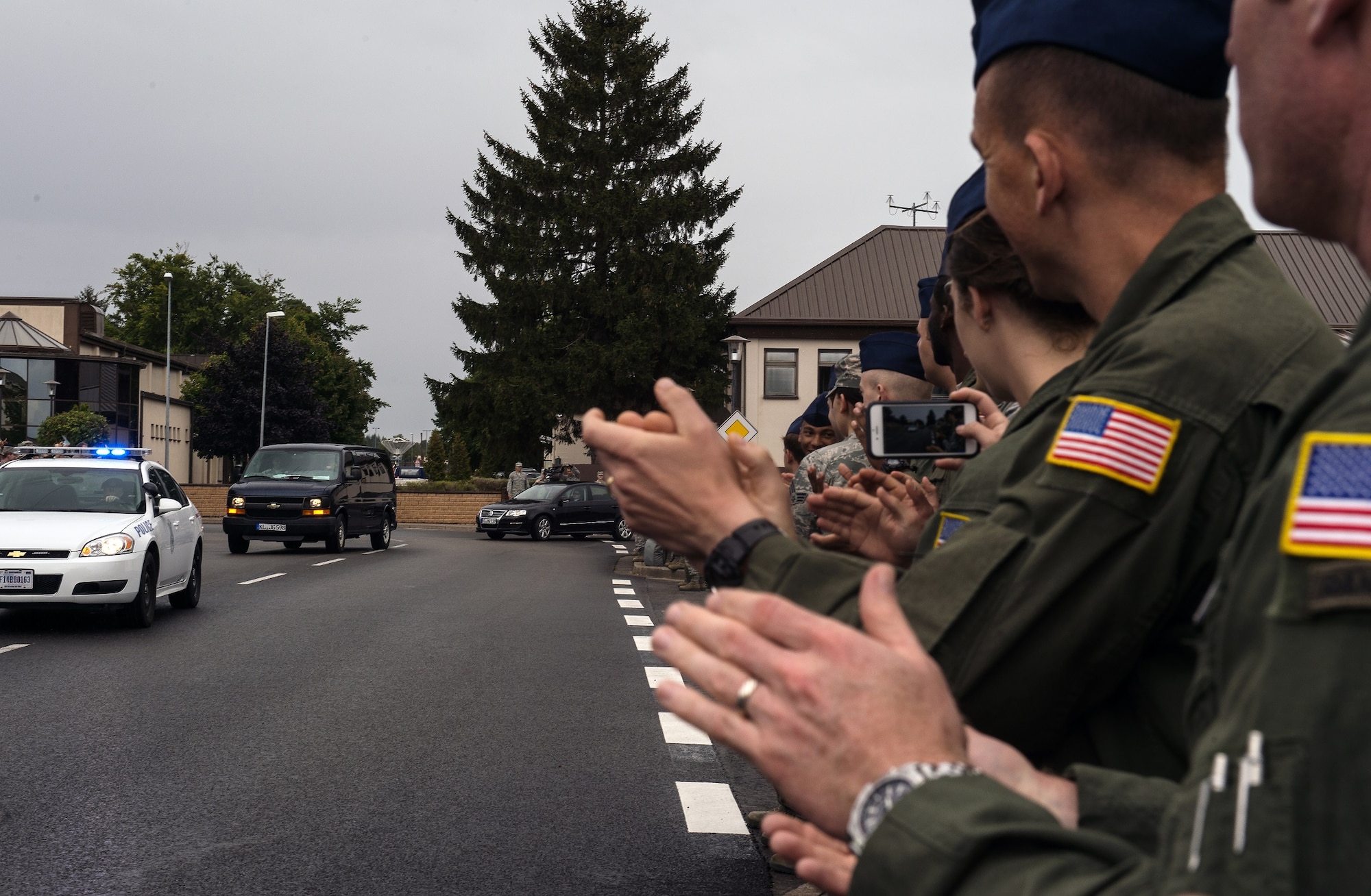 Airman 1st Class Spencer Stone is greeted with a "Heroic Welcome" as he and Oregon National Guardsman Aleksander Skarlatos arrive at Ramstein Air Base, Germany, Aug. 24. 2015. More than 200 Airmen and their families came out to line the streets of Ramstein and thank Stone and his friends for their bravery. Stone, along with childhood friends Skarlatos and Anthony Sadler, was recently honored by French President François Hollande with the French Legion of Honour for subduing an armed gunman when he entered their train carrying an assault rifle, a handgun and a box cutter. Stone is an ambulance service technician with the 65th Medical Operations Squadron stationed at Lajes Field, Azores. (U.S. Air Force Photo/Staff Sgt. Sara Keller)