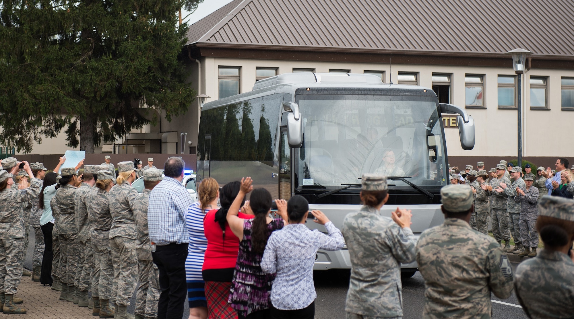 Oregon National Guardsman Aleksander Skarlatos is greeted upon is arrival to Ramstein Air Base, Germany, Aug. 24, 2015. More than 200 Airmen and their families came out to line the streets and thank Skarlatos and Airman 1st Class Spencer Stone for their bravery. They arrived at Ramstein while in transit to Landstuhl Regional Medical Center for follow-on medical treatment. Stone received multiple injuries, all of which were non-life threatening, while subduing an armed gunman on a train traveling from Amsterdam to Paris. Stone is an ambulance service technician with the 65th Medical Operations Squadron stationed at Lajes Field, Azores. (U.S. Air Force photo/Senior Airman Damon Kasberg)