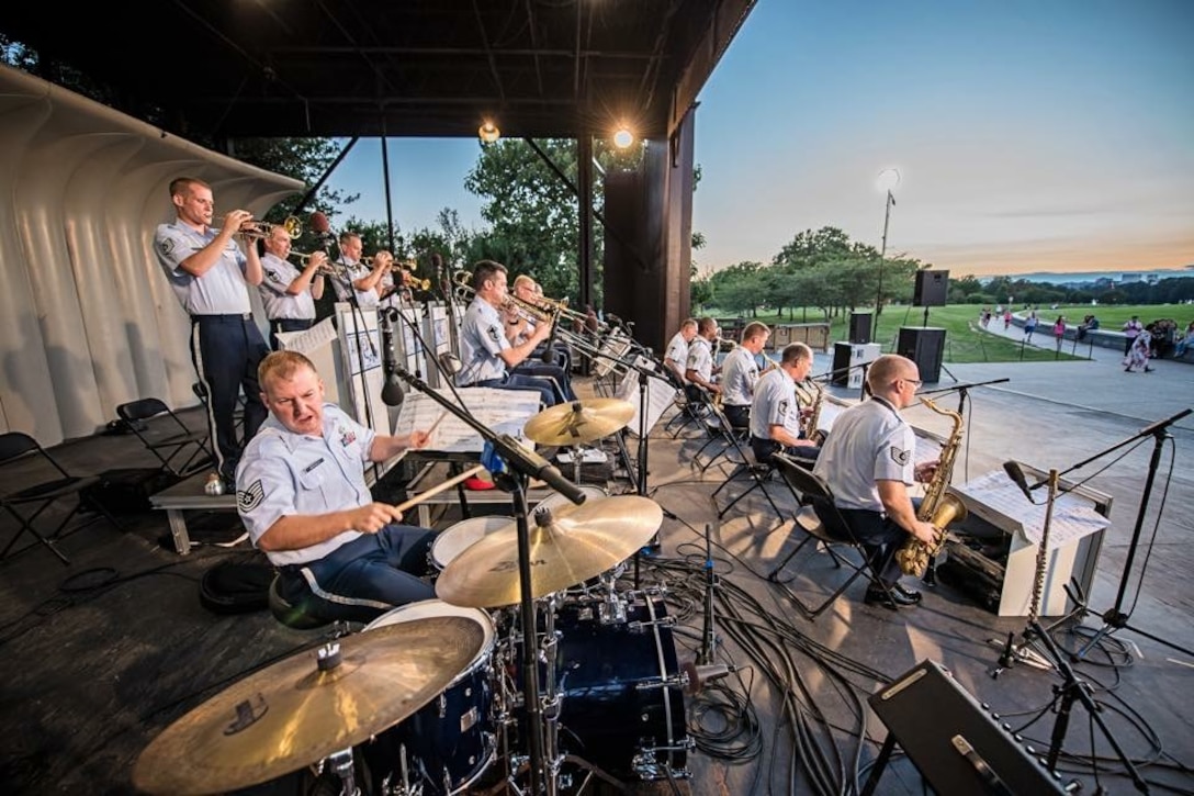 Technical Sergeant David McDonald, drum set, leads the Airmen of Note in their concert at the Sylvan Theater at the base of the Washington Monument in D.C. (U.S. Air Force Photo by Senior Master Sgt. Kevin Burns/released)