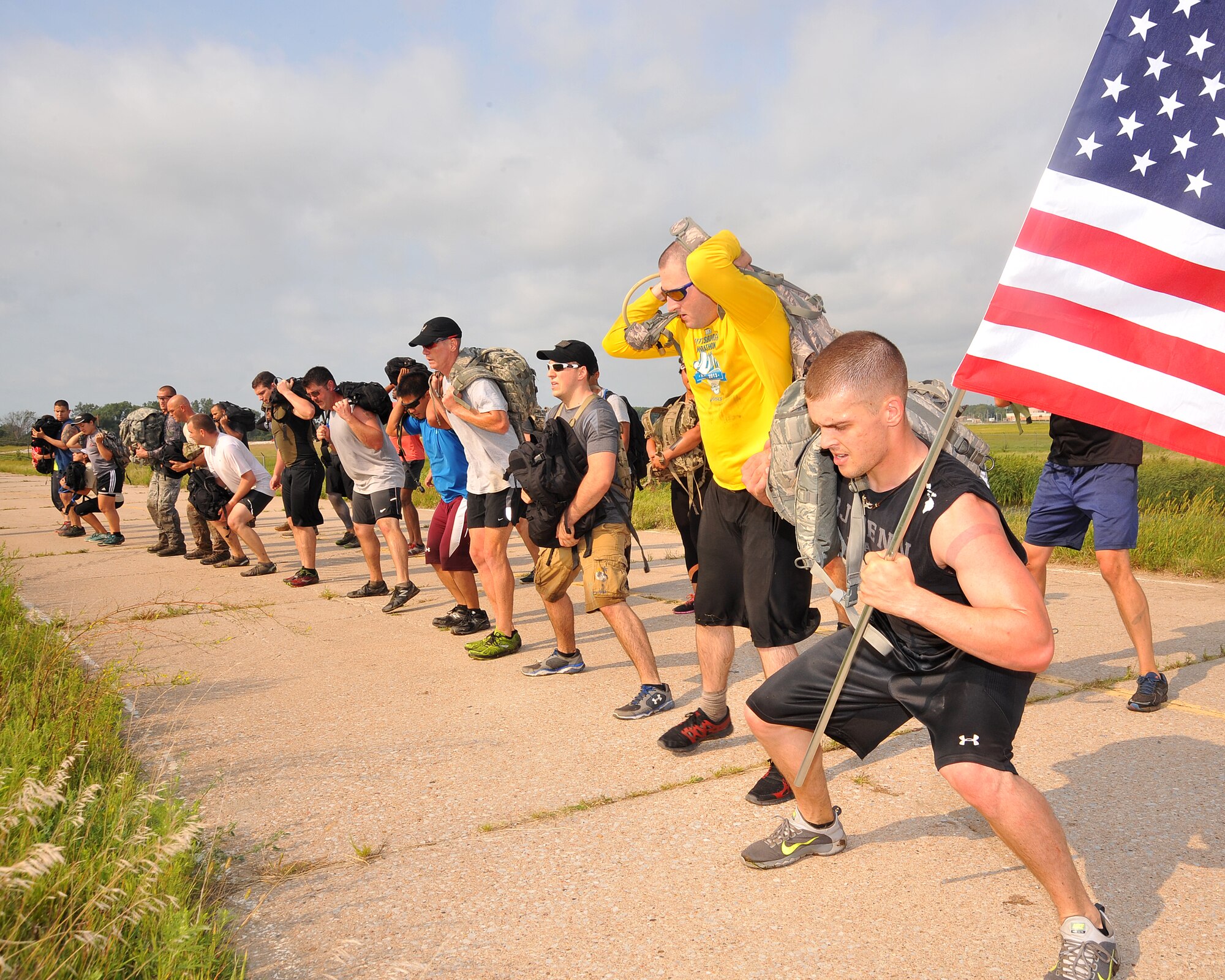 Team Offutt members are put through multiple physical challenges during the Team Cohesion Challenge held on Aug. 22, 2015, at Offutt Air Force Base, Nebraska. The challenge is built around special operations training, and designed to teach leadership, promote unit cohesion and inspire teams to perform their best (U.S. Air Force photo by D.P. Heard/Released)