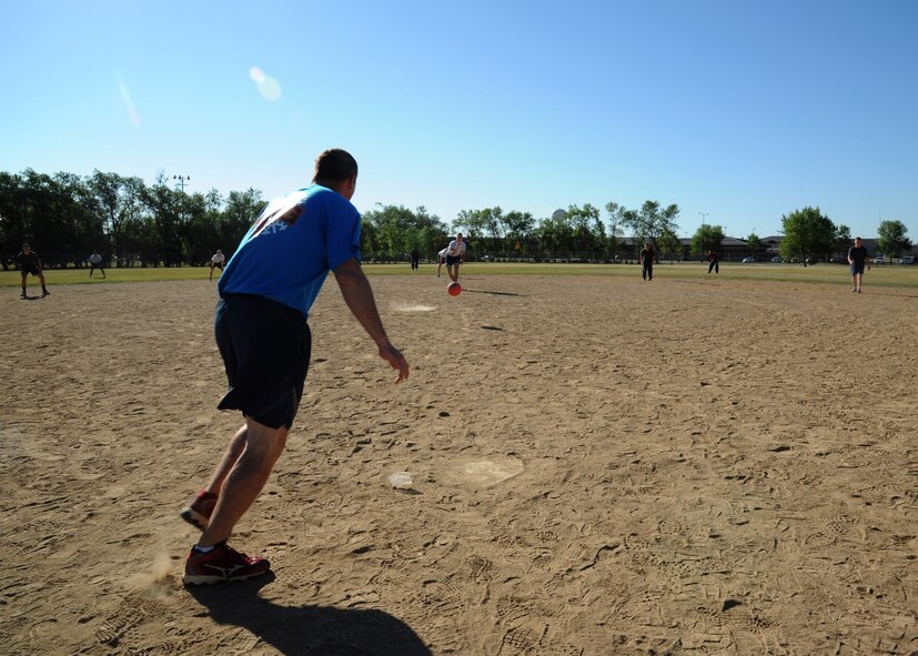 Tech. Sgt. Thomas Sullivan, 319th Medical Support Squadron medical laboratory technician, plays in the Summer Bash kickball tournament August 20, 2015, on Grand Forks Air Force Base, North Dakota. Summer Bash 2015 was a morale day provided to Airmen and their families. Squadrons competed to be named Summer Bash 2015 champions. (U.S. Air Force photo by Airman 1st Class Ryan Sparks/Released)