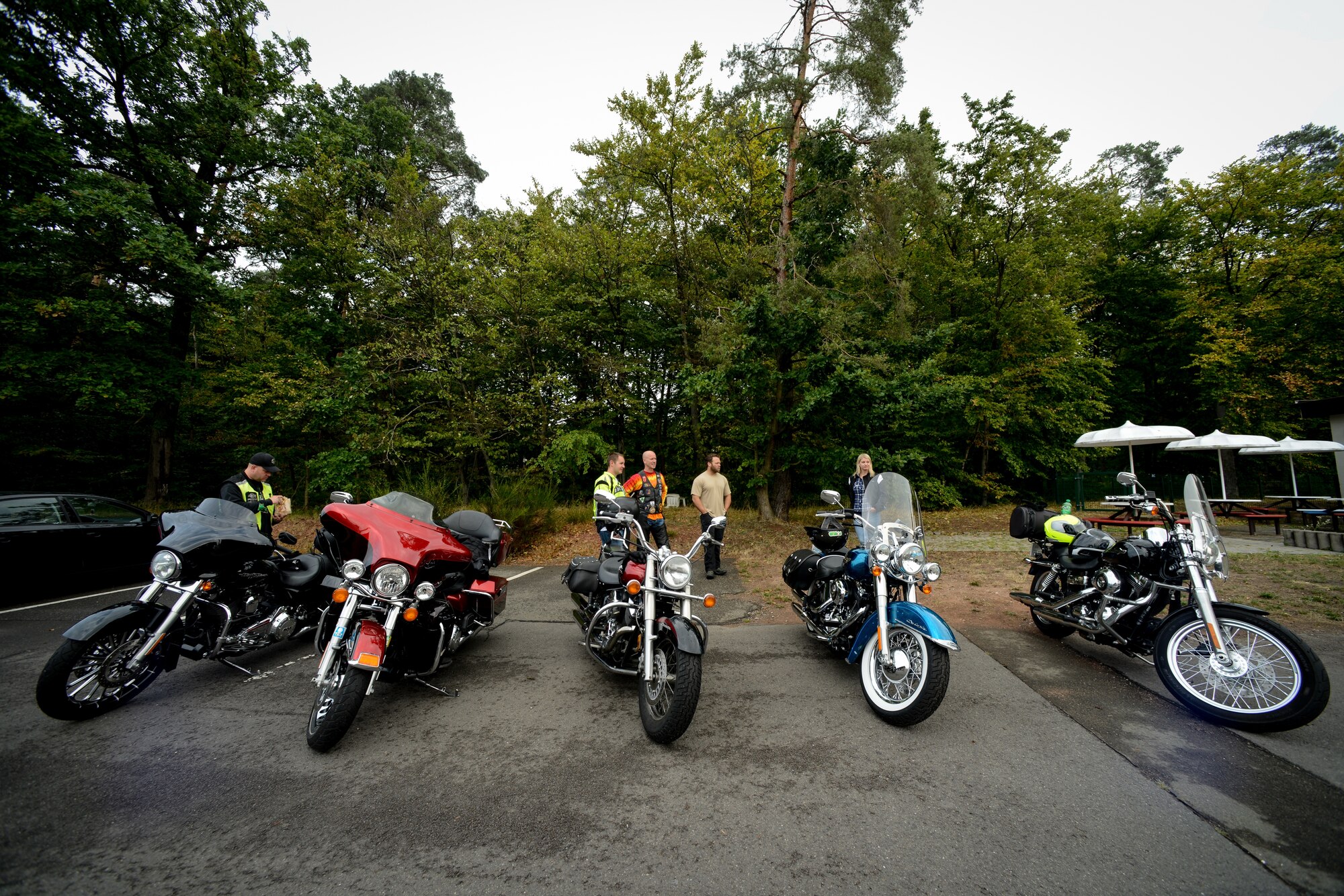 Airmen from the 435th Contingency Response Group gather for a motorcycle mentor ride Aug. 15, 2015, at Ramstein Air Base, Germany.  The annual ride started out as a squadron event and eventually branched out to the wing, giving inexperienced riders the opportunity to ride alongside someone who is familiar with European roads. (U.S. Air Force photo/Senior Airman Nicole Sikorski)