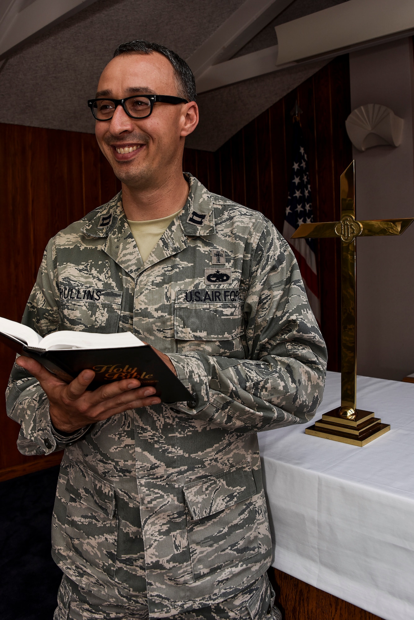 Capt. William Mullins, 911th Airlift Wing deputy wing chaplain, holds church service for Airmen at the Pittsburgh International Airport Air Reserve Station, Aug. 22, 2015. As a base chaplain, Mullins has the responsibility of caring for the religious, spiritual, and moral well-being of Airmen and their families. Mullins is entrusted with the confidential counsel of Airmen and also represents this month’s Airmen of the Burgh. (U.S. Air Force photo by Staff Sgt. Joshua J. Seybert)