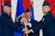 Col. David Pavey (right) takes the 514th Air Mobility Wing guidon from 4th Air Force commander Maj. Gen. John Flournoy at a change-of-command ceremony at Joint Base McGuire-Dix-Lakehurst, N.J., Aug. 22. Pavey previously served as the director of staff at the 4th AF at March Air Reserve Base, Calif. Col. Michael Underkofler departed the Freedom Wing--after more than four years as its commander--to take a position as the director of staff for the 22nd AF at Dobbins Air Reserve Base, Ga.