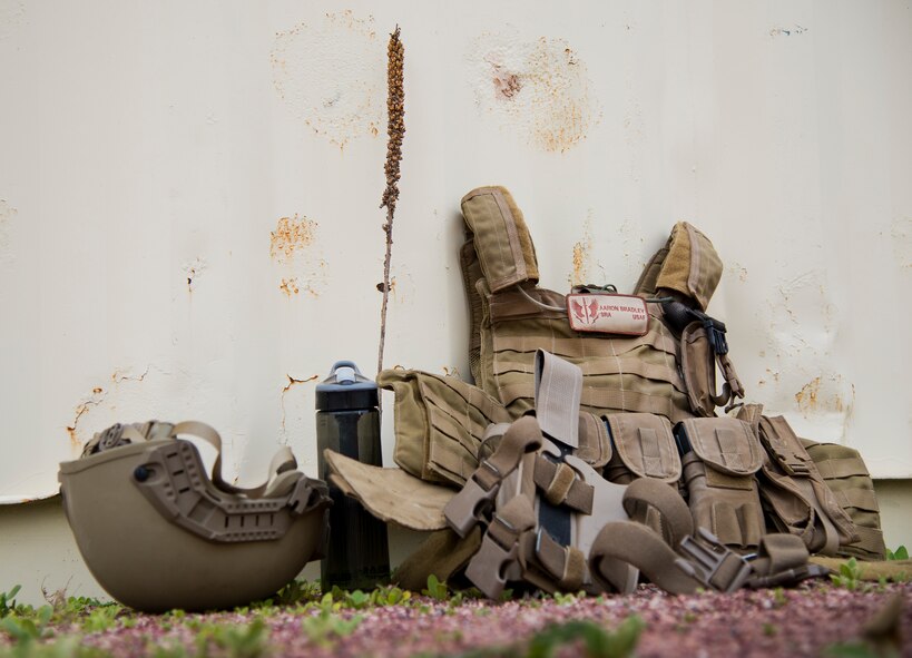 Equipment from the 919th Special Operations Security Forces Squadron sits ready for use during a break in the action of the squadron’s annual training at Camp Guernsey, Wyo., Aug. 3.  More than 20 Airmen went out West to help train two other Reserve security forces squadrons in ground combat and field training.  The 919th SOSFS Airmen lived in the makeshift camps and acted as opposing forces and local villagers interacting with the occupying security teams. (U.S. Air Force photo/Tech. Sgt. Sam King)