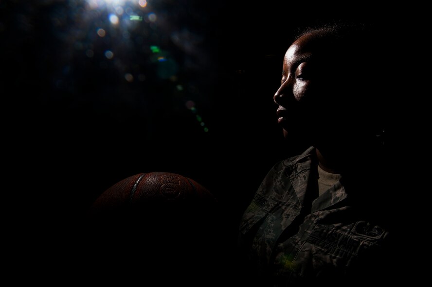 U.S. Air Force Staff Sgt. Lydia Lewis, a 52nd Force Support Squadron sports program manager, poses for a photo during a swing shift at the Eifel Powerhaus on Spangdahlem Air Base, Germany, Aug. 20, 2015. The fitness center opened January 13, 2014, and operates between the hours of 4 a.m. to 10 p.m. on weekdays and 8 a.m. to 8 p.m. on weekends. (U.S. Air Force photo by Airman 1st Class Timothy Kim/Released)