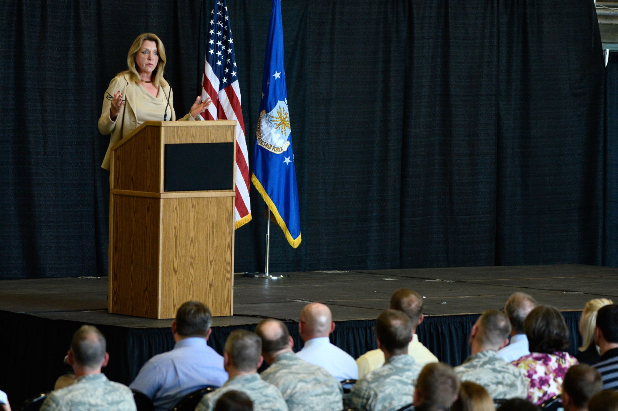 Secretary of the Air Force Deborah Lee James speaks to the workforce during an all-call at Hanscom Air Force Base, Mass., Aug. 21. During the all-call, James outlined her three priorities, discussed Air Force issues, budget challenges and answered questions during a Q&A session with Airmen. (U.S. Air Force photo by Mark Herlihy)