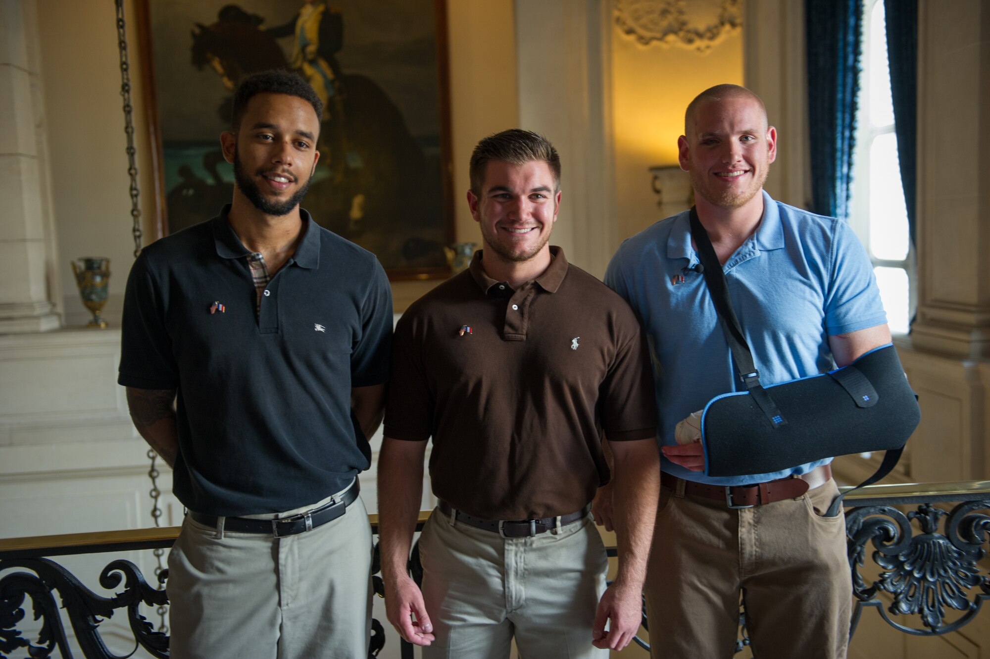 (Right to left) Airman 1st Class Spencer Stone, Aleksander Skarlatos and Anthony Sadler pose for a photo in Paris Aug. 23, 2015, following a foiled attack on a French train. Stone was on vacation with his childhood friends, Aleksander Skarlatos and Anthony Sadler, when an armed gunman entered their train carrying an assault rifle, a handgun and a box cutter. The three friends, with the help of a British passenger, subdued the gunman after his rifle jammed. Stone’s medical background prepared him to begin treating wounded passengers while waiting for the authorities to arrive. Stone is an ambulance service technician with the 65th Medical Operations Squadron stationed at Lajes Field, Azores. (U.S. Air Force photo/Tech. Sgt. Ryan Crane)