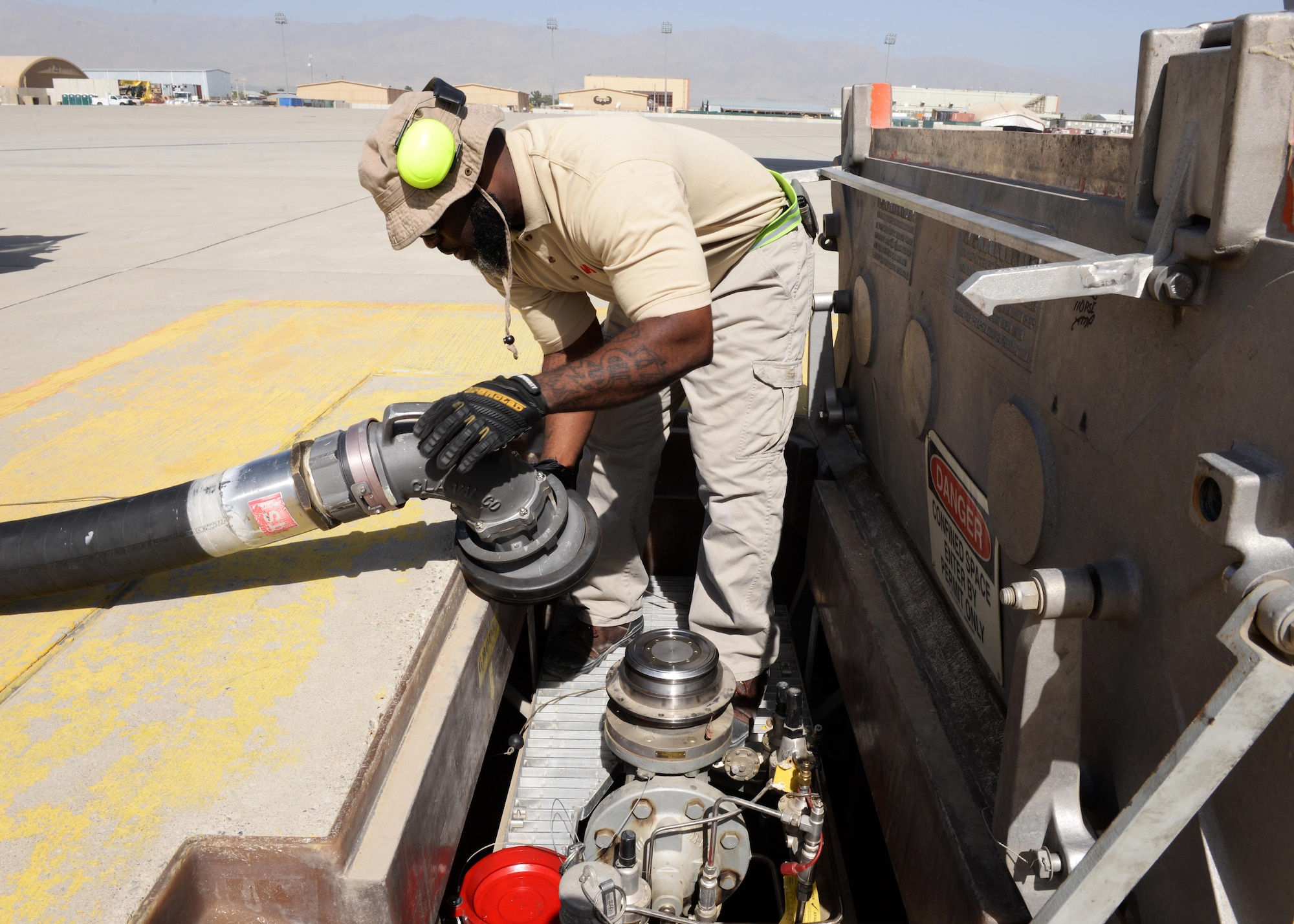 John Jackson, 455th Expeditionary Logistics Readiness Squadron fuels technician, prepares to run fuel through a hydrant system Aug. 22, 2015, at Bagram Airfield, Afghanistan. Jackson is a contractor with the Ingenuity and Purpose contracting company and is responsible for fueling all aircraft that come to and from Bagram. (U.S. Air Force photo by Senior Airman Cierra Presentado/Released)