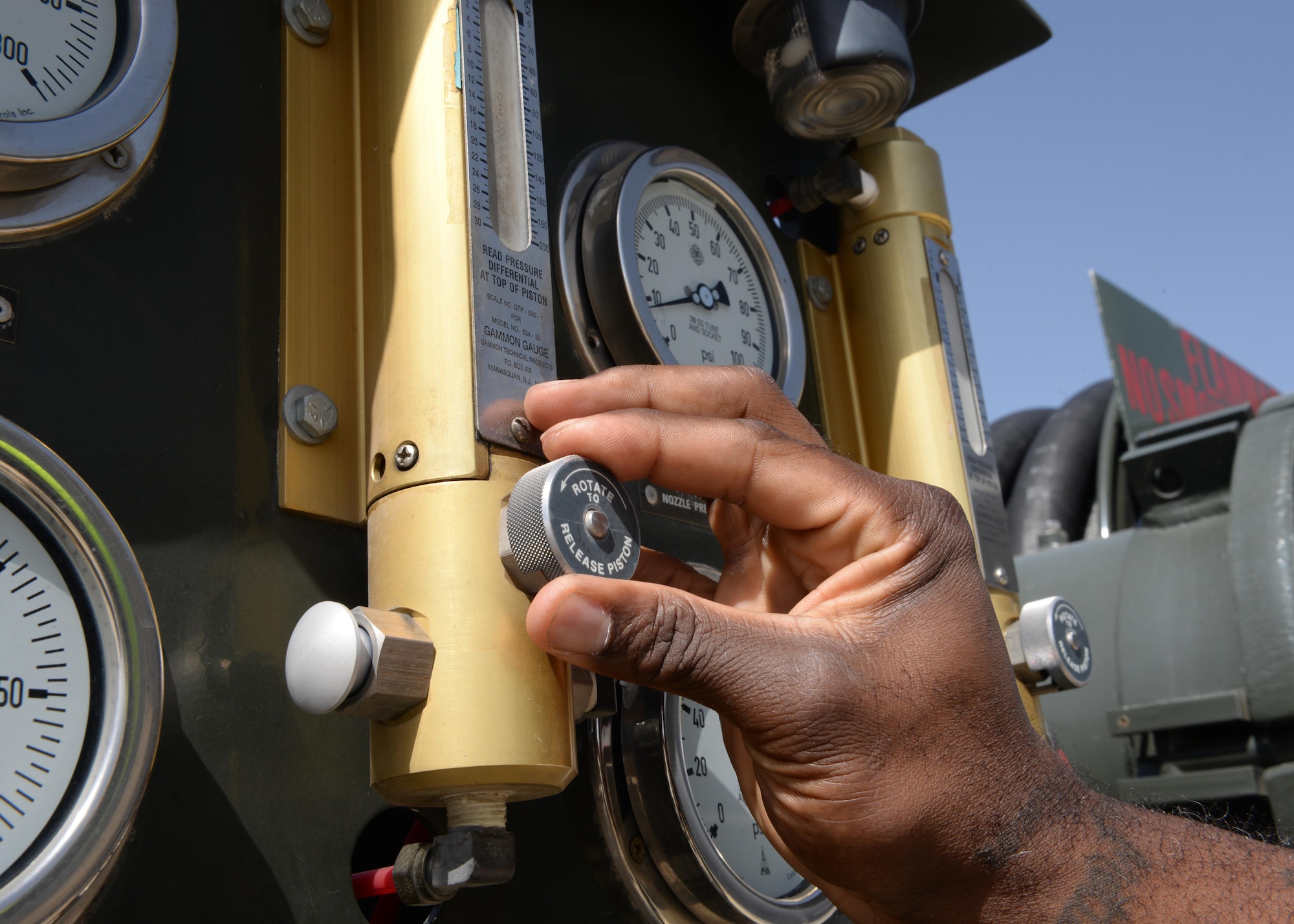 John Jackson, 455th Logistics Readiness Squadron fuels technician, prepares to fuel an aircraft using an R-12 hydrant system truck Aug. 22, 2015, on Bagram Airfield, Afghanistan. Jackson is a contractor with the Ingenuity and Purpose contracting company and is responsible for fueling all aircraft that come to and from Bagram. (U.S. Air Force photo by Senior Airman Cierra Presentado/Released)