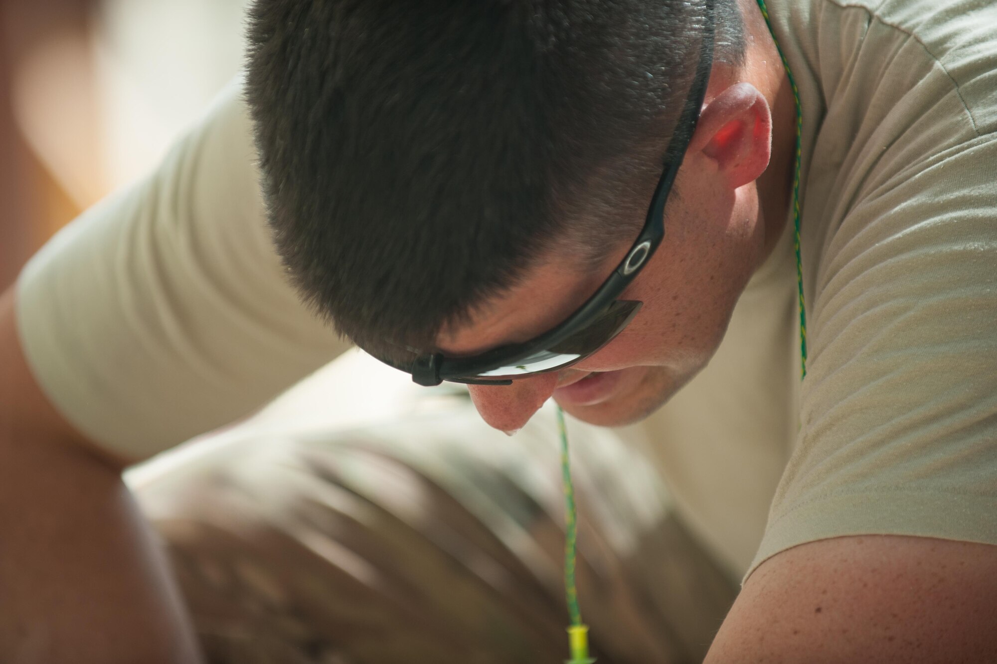 U.S. Air Force Tech. Sgt. Dallan Livingston, 451st Expeditionary Support Squadron Central Command Material Recovery Element air transportation specialist, builds a set of stairs for a defensive fighting position at Kandahar Airfield, Afghanistan, Aug. 15, 2015.  Livingston has been using his carpentry skills during his spare time to build projects to better KAF. (U.S. Air Force photo by Tech. Sgt. Joseph Swafford/Released)