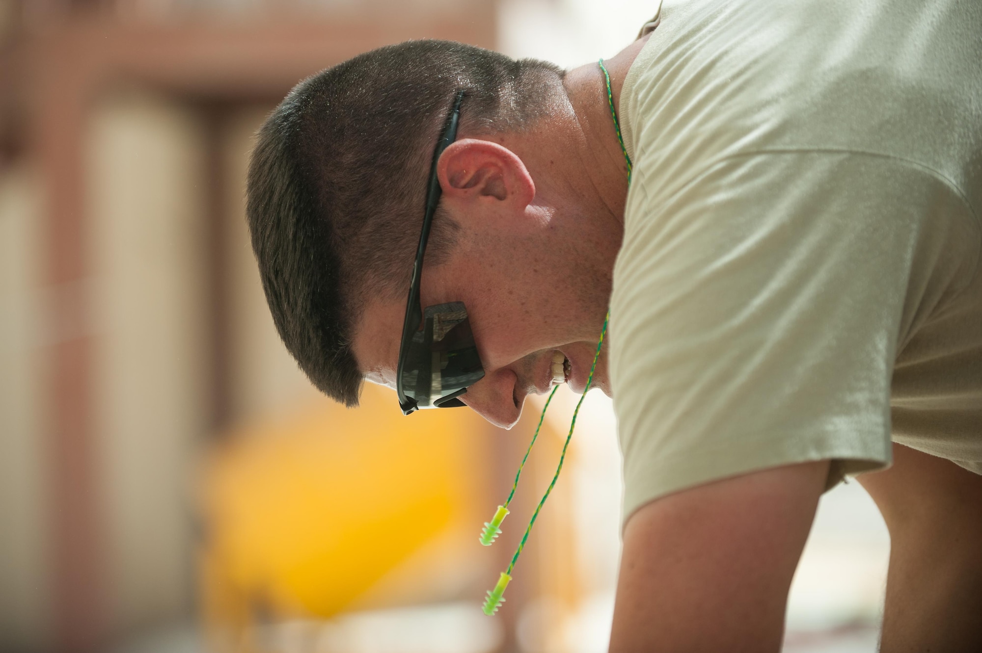 U.S. Air Force Tech. Sgt. Dallan Livingston, 451st Expeditionary Support Squadron Central Command Material Recovery Element air transportation specialist, builds a set of stairs for a defensive fighting position at Kandahar Airfield, Afghanistan, Aug. 15, 2015.  Livingston has been using his carpentry skills during his spare time to build projects to better KAF. (U.S. Air Force photo by Tech. Sgt. Joseph Swafford/Released)