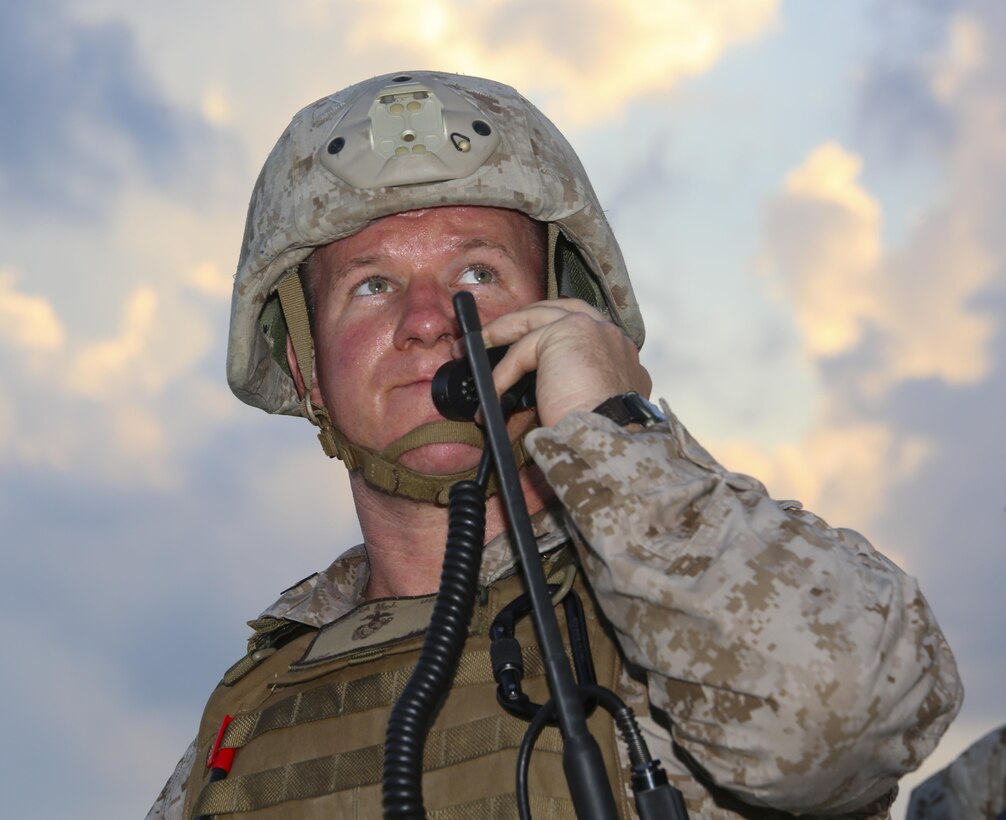 A Marine with 2nd Air Naval Gunfire Liaison Company helps conduct joint tactical air control for Marine Unmanned Aerial Vehicle Squadron 2, Marine Fighter Attack Squadron 115, and Marine All-Weather Fighter Attack Squadron 533 aboard Camp Lejeune, N.C., Aug. 12, 2015. Marines with 2nd ANGLICO conduct exercises involving close air support at least once a month in order to maintain combat readiness and excellence. (U.S. Marine Corps photo by Pfc. Erick Galera/Released)
