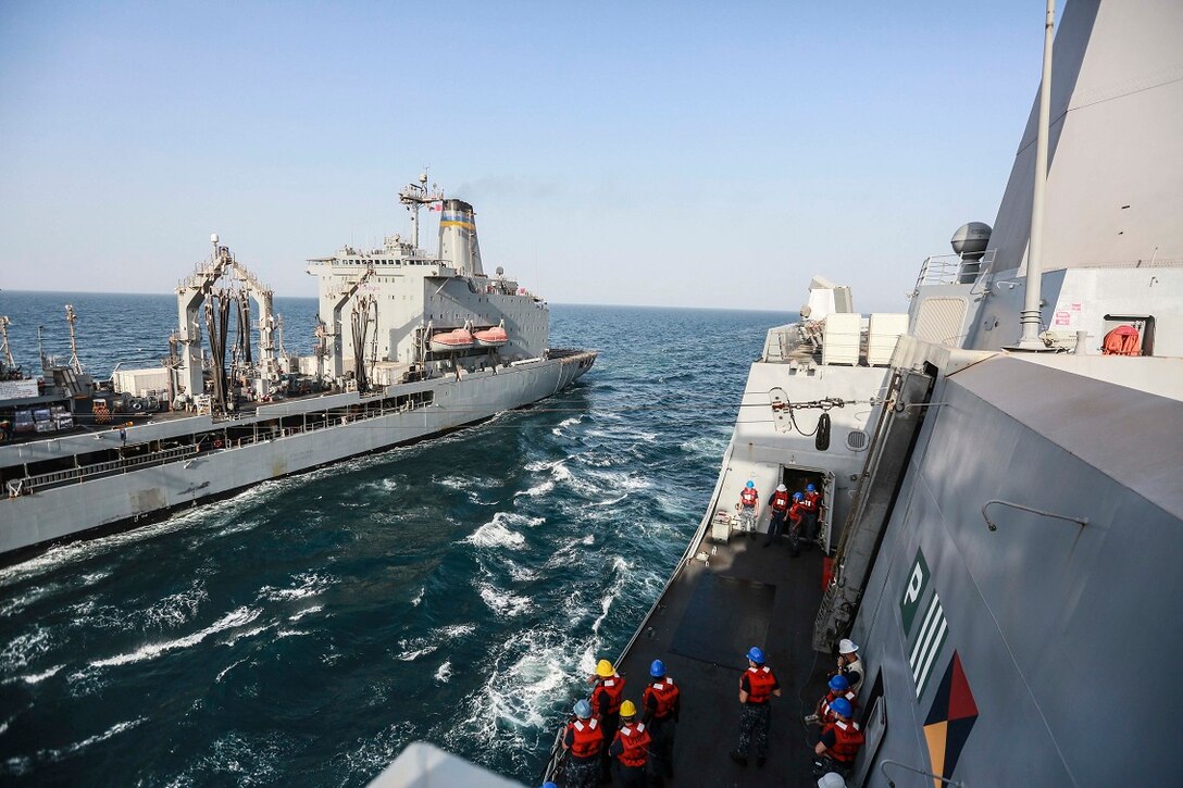 GULF OF ADEN (Aug. 22, 2015) The USNS John Ericsson (T-AO194) delivers supplies and goods to the amphibious transport dock ship USS Anchorage (LPD 23) during a replenishment-at-sea. Elements of the 15th Marine Expeditionary Unit are embarked aboard the Anchorage, which is part of the Essex Amphibious Ready Group, and are deployed in support of maritime security operations and theater security cooperation efforts in the U.S. 5th Fleet area of operations.  (U.S. Marine Corps photo by Sgt. Steve H. Lopez/Released)