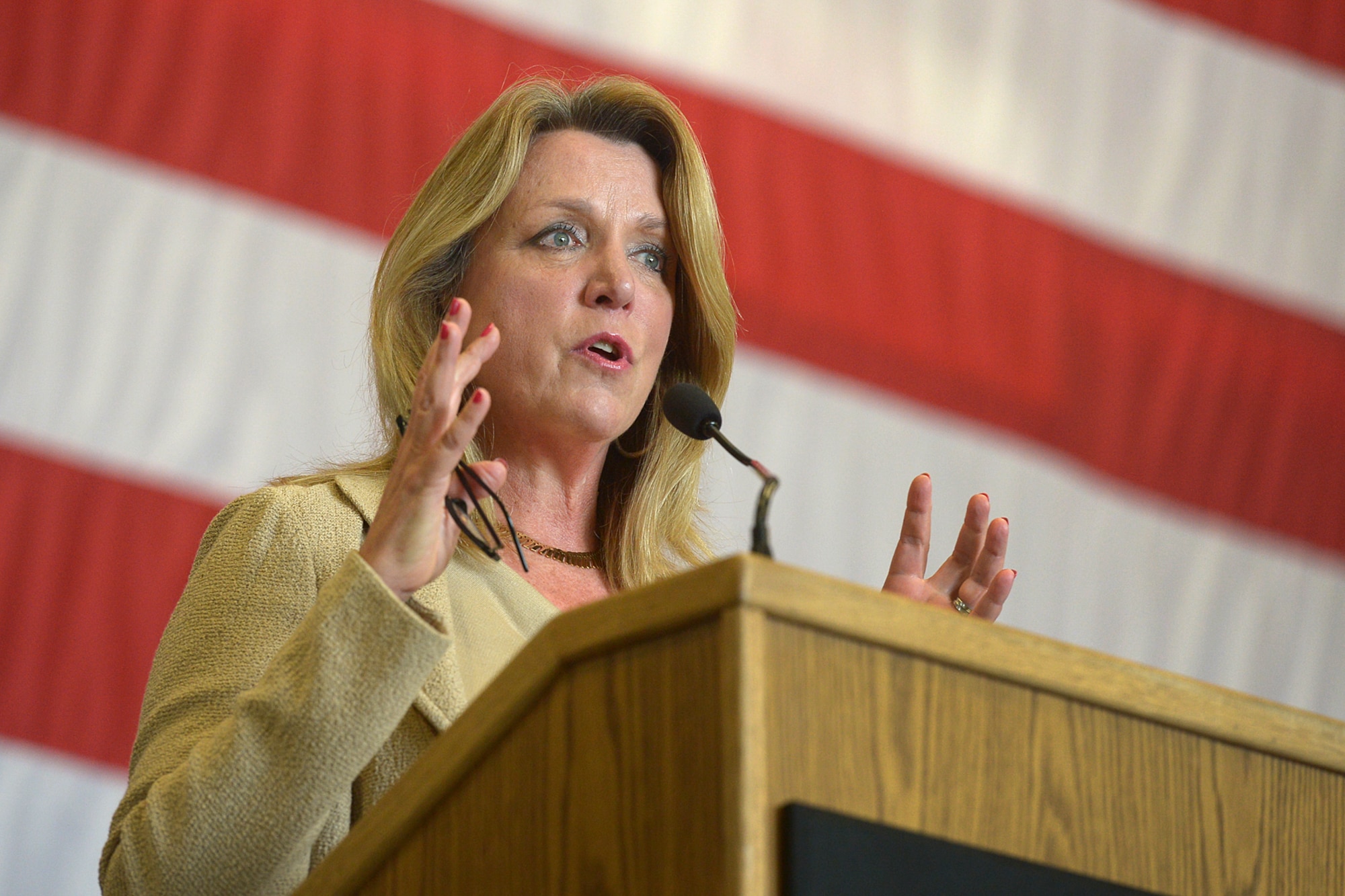 Secretary of the Air Force Deborah Lee James speaks during a basewide all-call at Hanscom Air Force Base, Mass., Aug. 21, 2015. During the all-call, James outlined her three priorities, discussed Air Force issues, budget challenges and answered questions during a Q&A session with Airmen. (U.S. Air Force photo/Jerry Saslav) 