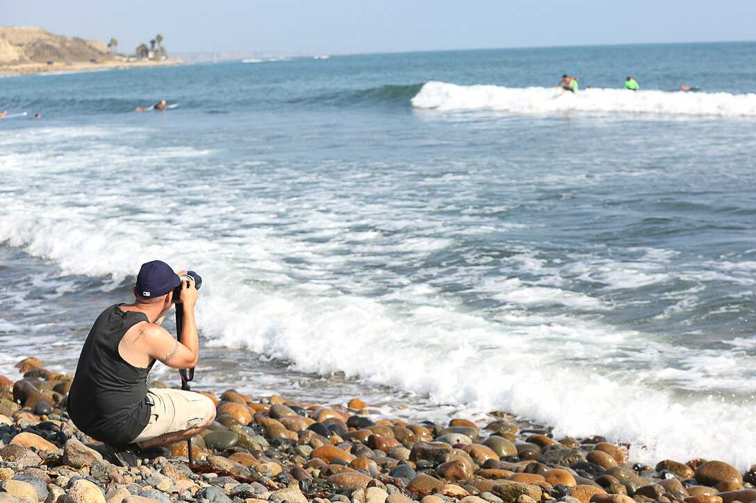 Staff Sergeant Matthew L. Slade photographs Operation Amped surfers on San Onofre Beach, August 21. Slade is a wounded warrior and student of Wounded Warrior Battalion West’s photography class, fStop. The fStop Warrior Project supports wounded warriors’ recovery and transition through creative self-expression using the art of digital photography.