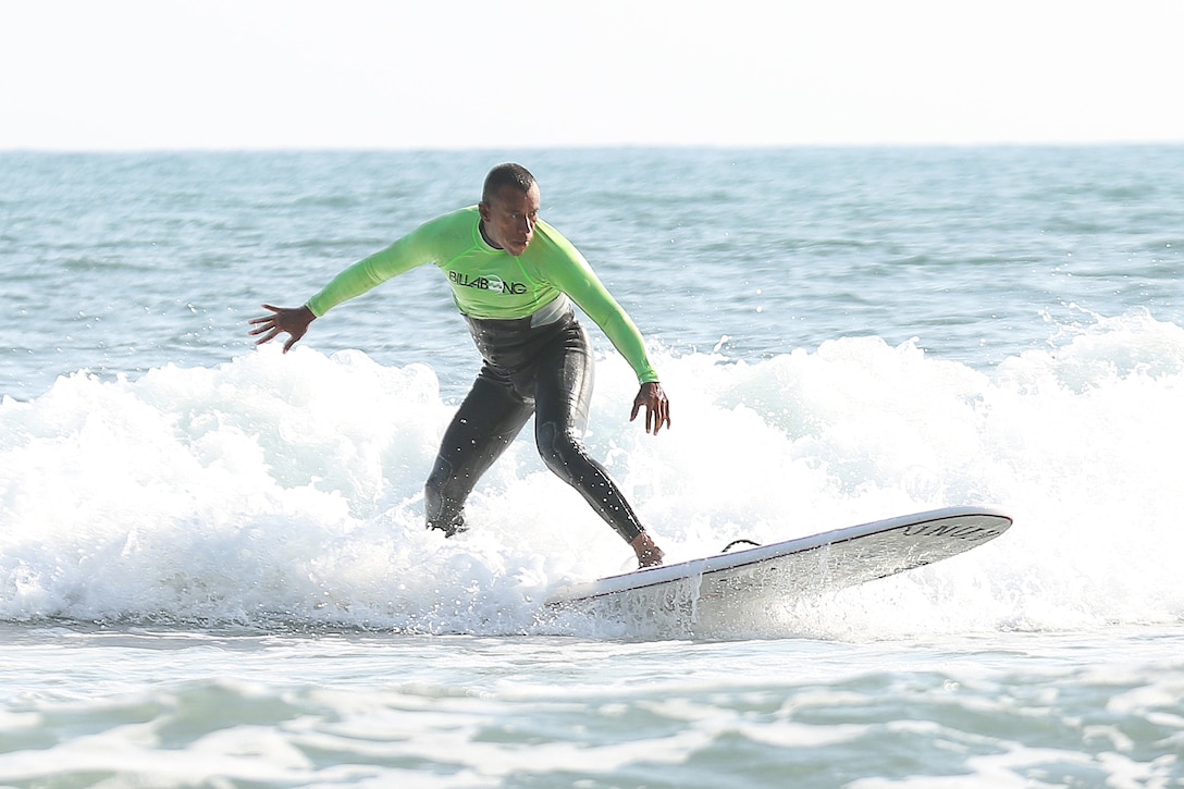 Master Sergeant Hugo L. Gonzalez surfs with Operation Amped at San Onofre Beach, August 21. Operation Amped is an annual weekend surfing event open to Wounded Warriors and their families. Operation Amped’s mission is to share the surfing community and the healing potential of surfing with seriously ill, injured, or disabled U.S. military veterans and their families.