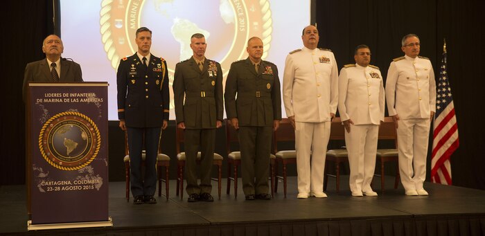 The senior naval infantry leaders of the Colombian Navy and Marine Corps stand with Lieutenant Gen. Robert B. Neller, center, commanding general of U.S. Marine Corps Forces Command and representative of the commandant of the Marine Corps, the commanding general of U.S. Marine Corps Forces, South and the Senior Defense Official of Colombia during the opening ceremony of the Marine Leaders of the Americas Conference 2015 in Cartagena, Colombia, Aug. 24, 2015. The conference provides a forum for regional and senior naval infantry leaders throughout the Western Hemisphere to discuss shared interests in humanitarian assistance and disaster relief matters and improve training programs among partner nations. (U.S. Marine Corps photo by Sgt. Alisa J. Helin/Released)