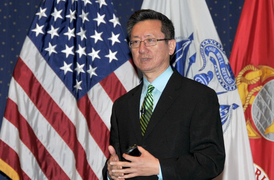 Dong Xiang describes the differences between American and Chinese cultures during an Asian-American and Pacific Islander Heritage Month observance at the McNamara Headquarters Complex May 13. 