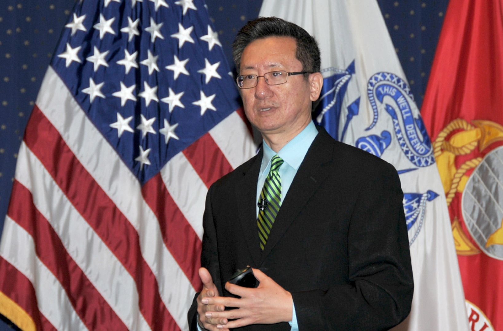 Dong Xiang describes the differences between American and Chinese cultures during an Asian-American and Pacific Islander Heritage Month observance at the McNamara Headquarters Complex May 13. 