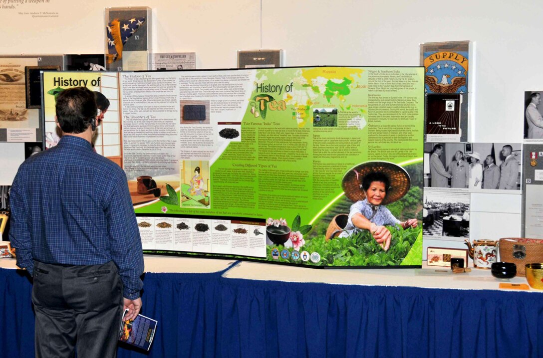 McNamara Headquarters Complex employees view displays of clothing and other cultural artifacts before an event honoring Asian-American and Pacific Islander Heritage May 13.