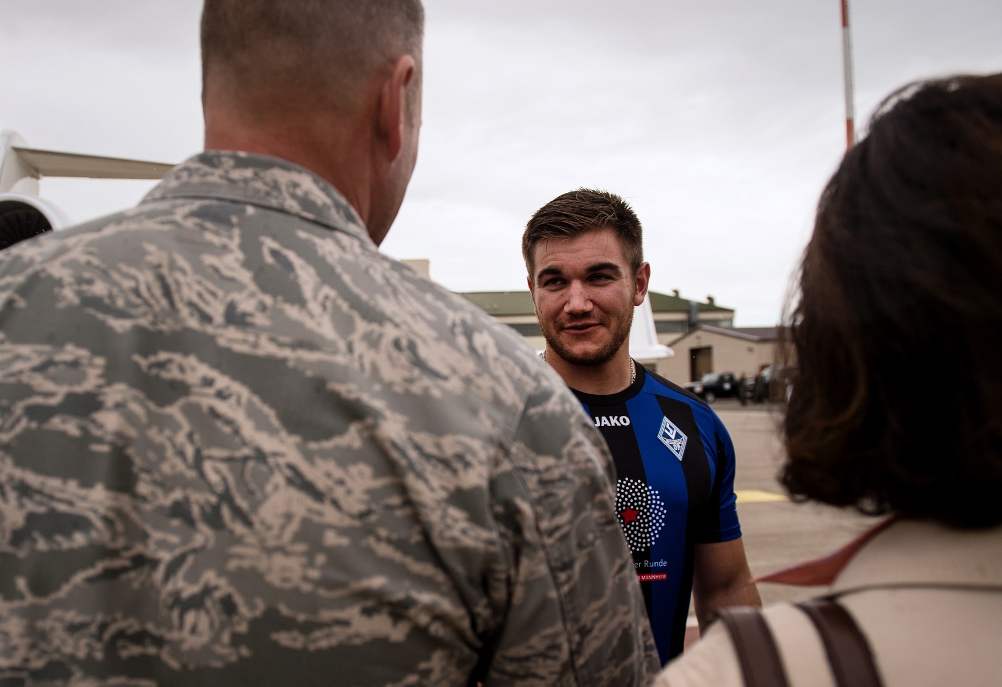 Aleksander Skarlatos, an Army specialist in the Oregon National Guard, meets Brig. Gen. Jon T. Thomas, the 86th Airlift Wing commander, as he arrives at Ramstein Air Base, Germany, Aug. 24. 2015. Skarlatos, along with childhood friends Airman 1st Class Spencer Stone and Anthony Sadler, was recently honored by French President François Hollande with the French Legion of Honor for subduing an armed gunman when he entered their train carrying an assault rifle, a handgun and a box cutter. (U.S. Air Force Photo/Staff Sgt. Sara Keller)