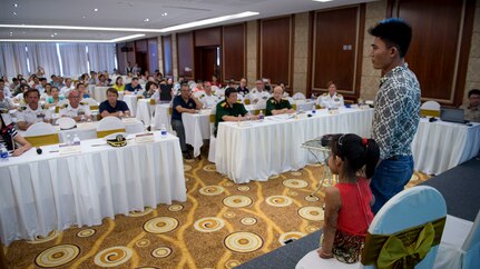 DA NANG, Vietnam (Aug. 22, 2015) - A Vietnamese father and his daughter speak to U.S. and Vietnamese medical personnel at the Da Nang Northern Hotel during a restorative medicine summit as part of Pacific Partnership 2015. The girl received reconstructive procedures from a previous Pacific Partnership mission after suffering widespread burns, and the father brought her to the summit to express his gratitude for the medical care. The hospital ship USNS Mercy (T-AH 19) is currently in Vietnam for its fourth mission port of PP15. Pacific Partnership is in its 10th iteration and is the largest annual multilateral humanitarian assistance and disaster relief preparedness mission conducted in the Indo-Asia-Pacific region. 