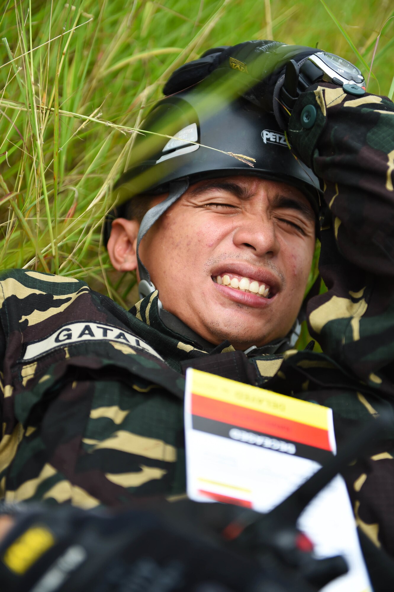 A member of the Philippine army provides aide for a person with simulated injuries during a mass-casualty exercise as part of Pacific Angel Philippines, Bohol province, Philippines, Aug. 21, 2015. The mass-casualty exercise was the culminating event of a five-day subject matter expert exchange between the U.S., the Philippines and Philippine non-governmental organizations. Efforts undertaken during Pacific Angel help multilateral militaries in the Pacific improve and build relationships across a wide spectrum of civic operations, which bolsters each nation’s capacity to respond and support future humanitarian assistance and disaster relief operations. (U.S. Air Force photo by Tech. Sgt. Aaron Oelrich/Released)