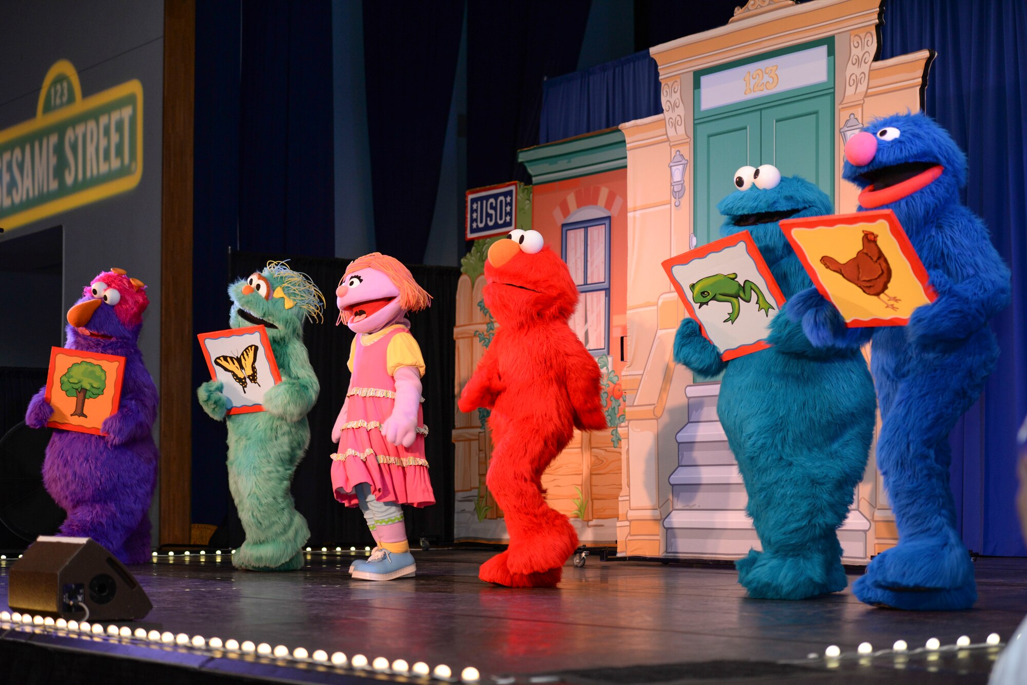 Muppets give children the opportunity to learn life lessons through song and dance during the United Service Organization Sesame Street presentation at Yokota Air Base, Japan, Aug. 21, 2015. In the show, Katie the Muppet learned that sometimes change is good, like moving to a new base. (U.S. Air Force photo by Airman 1st Class Elizabeth Baker/Released)