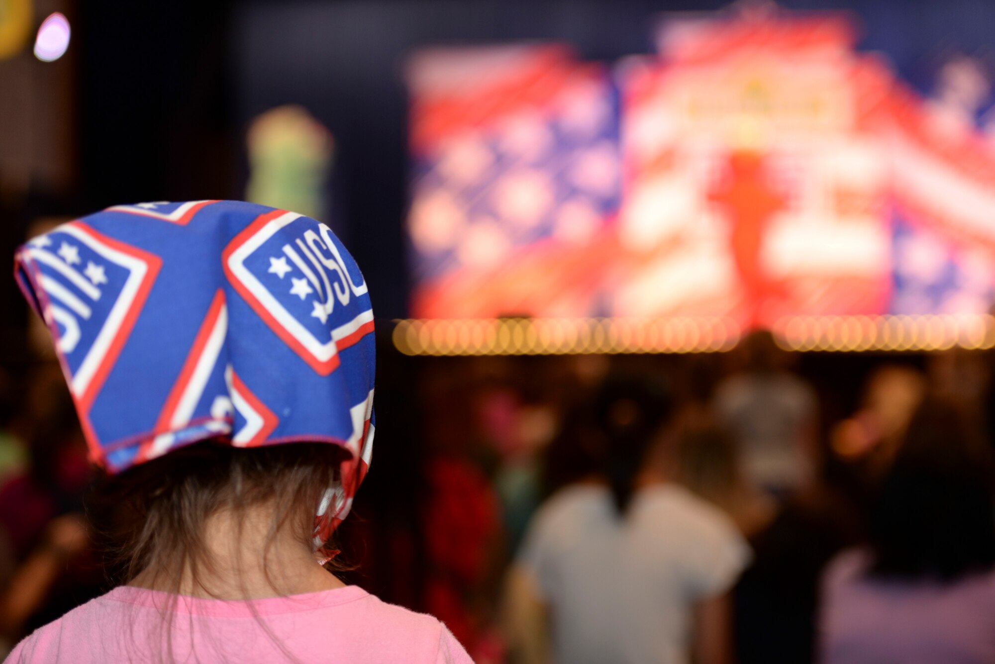 A child watches the United Service Organization Sesame Street presentation at Yokota Air Base, Japan, Aug. 21, 2015. During the presentation kids had the opportunity to learn tips on moving to a new base, like how to keep in touch with old friends and how to make new friends. (U.S. Air Force photo by Airman 1st Class Elizabeth Baker/Released)