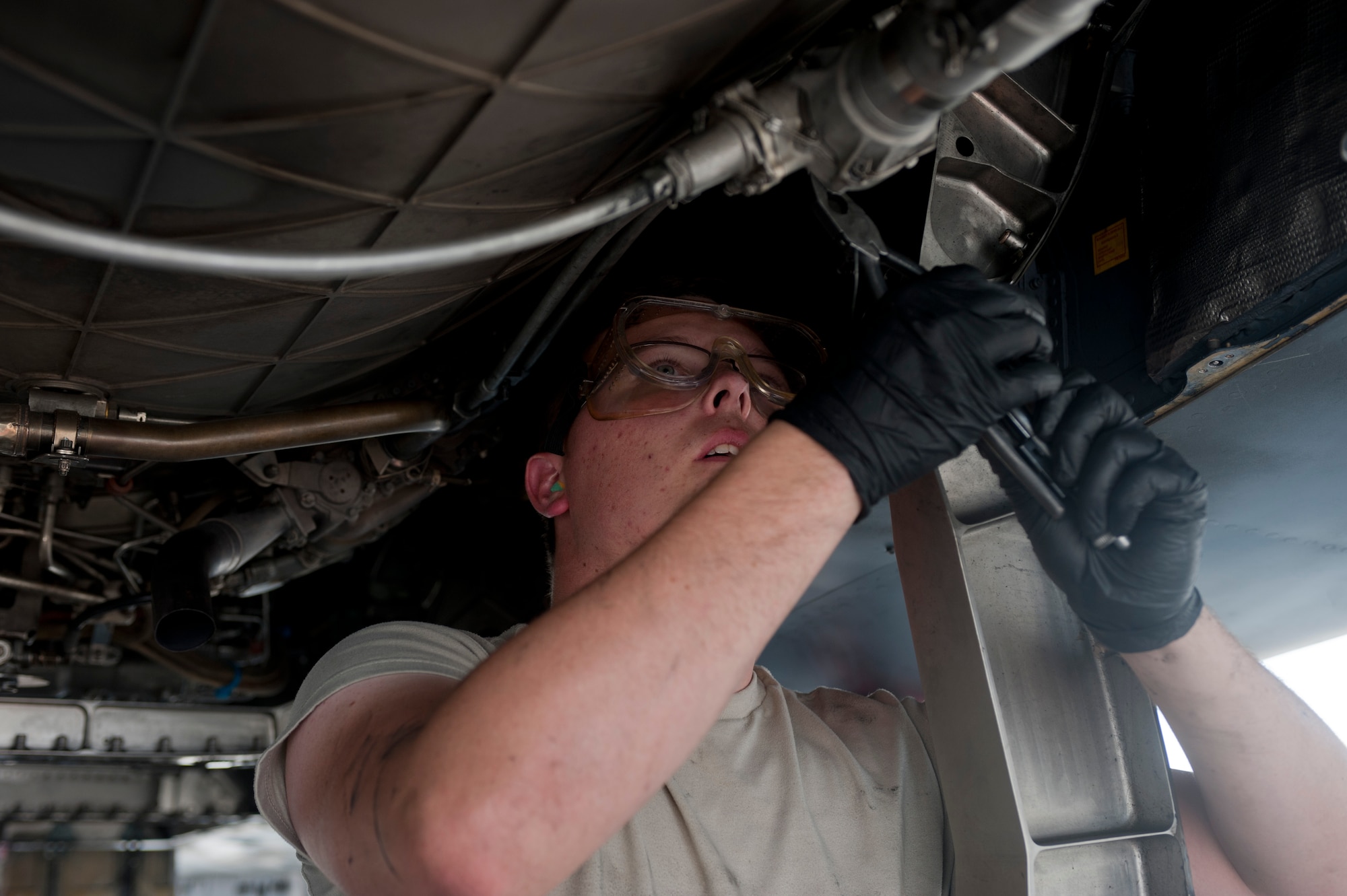 Airman 1st Class Thomas Overley, 757th Aircraft Maintenance Squadron Strike Aircraft Maintenance Unit aerospace propulsion specialist, performs an engine borescope inspection on an F-15E Strike Eagle on the flightline at Nellis Air Force Base, Nev., Aug. 19, 2015. Aerospace propulsions specialists help ensure that the aircraft’s engine is in operational condition. (U.S. Air Force photo by Airman 1st Class Mikaley Towle)